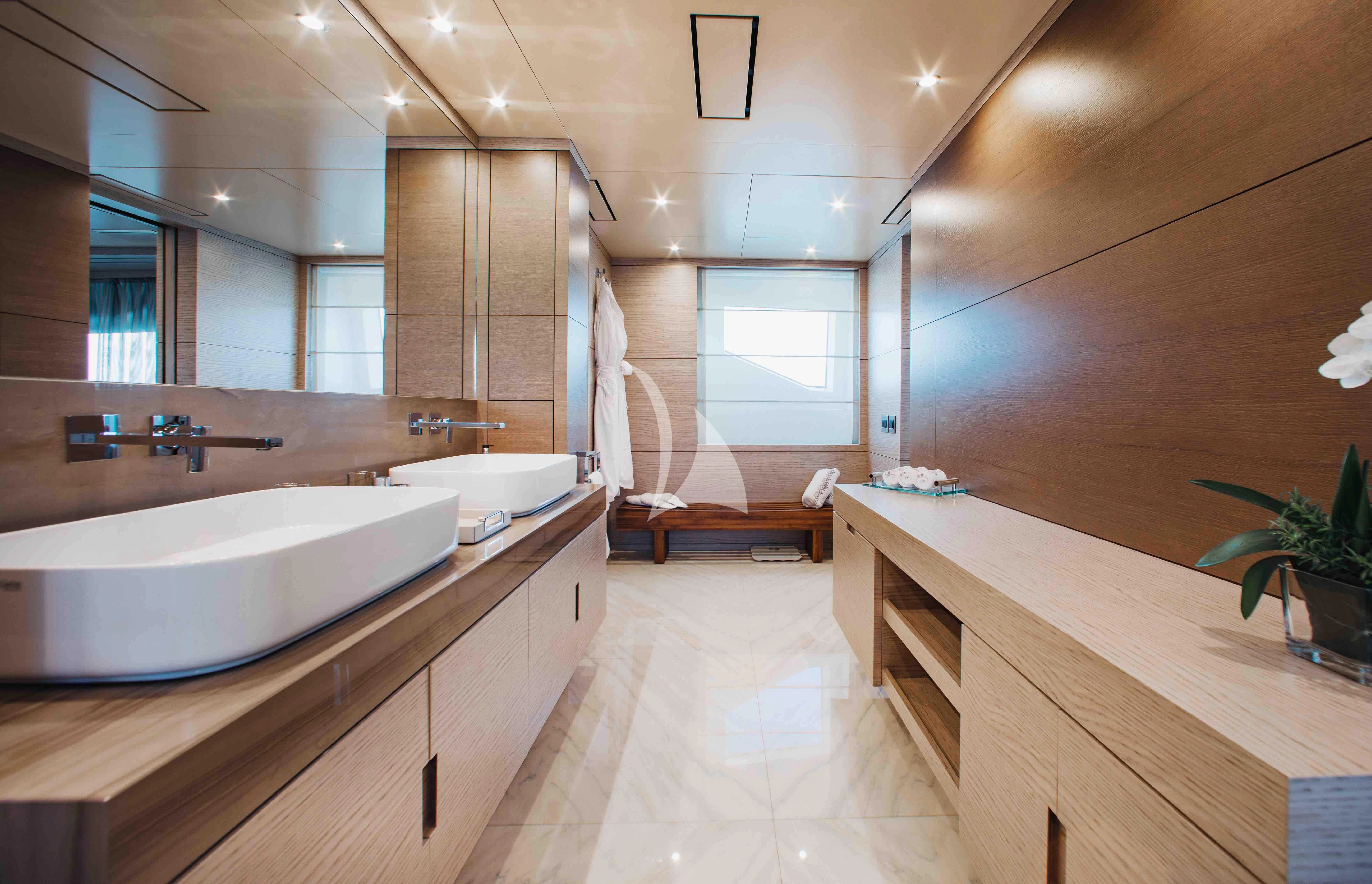 a bathroom with a large bathtub aboard COFINA Yacht for Sale