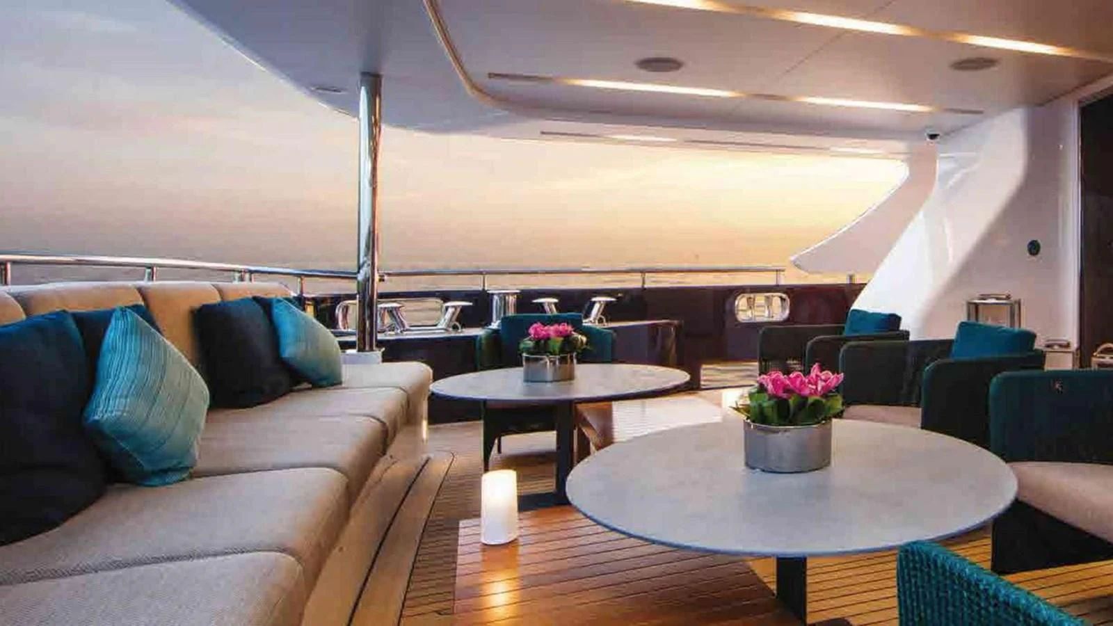 a room with a table and chairs aboard COFINA Yacht for Sale