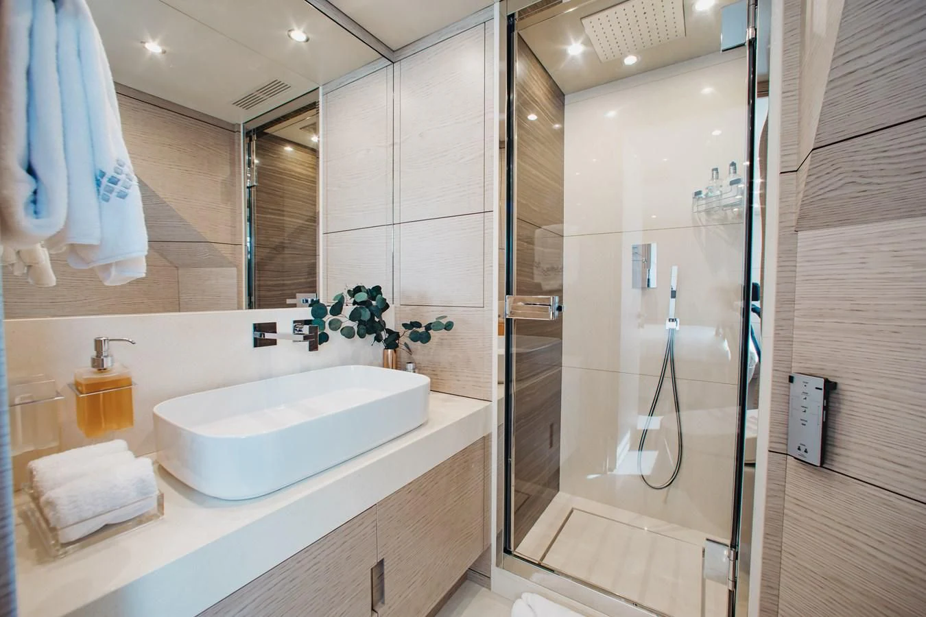 a bathroom with a sink and shower aboard COFINA Yacht for Sale