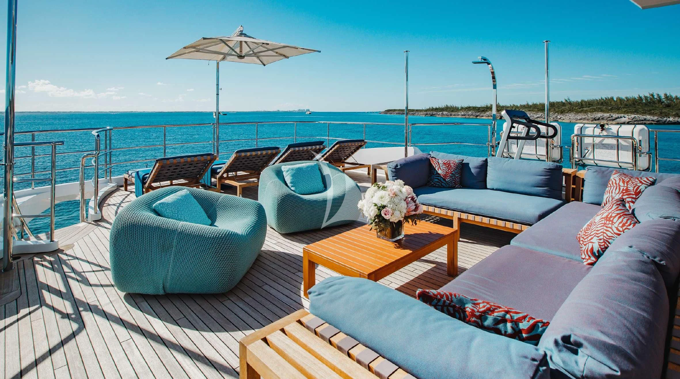 a living room with a large body of water aboard COFINA Yacht for Sale