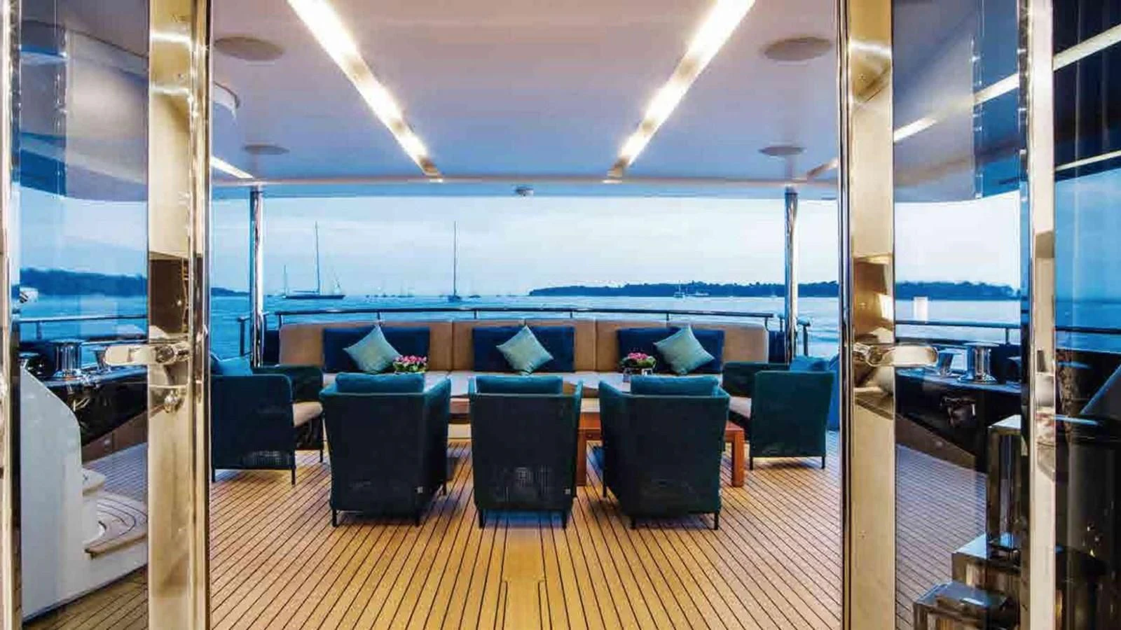 a room with a wood floor and a large window with a wood floor aboard COFINA Yacht for Sale