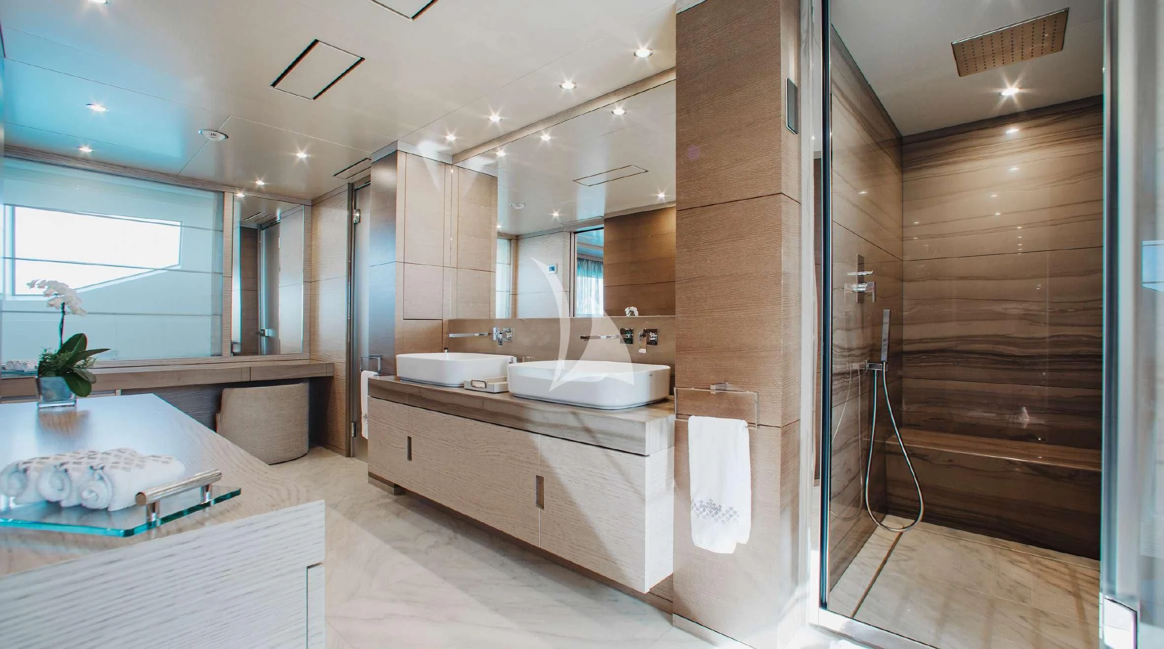 a bathroom with a tub and shower aboard COFINA Yacht for Sale