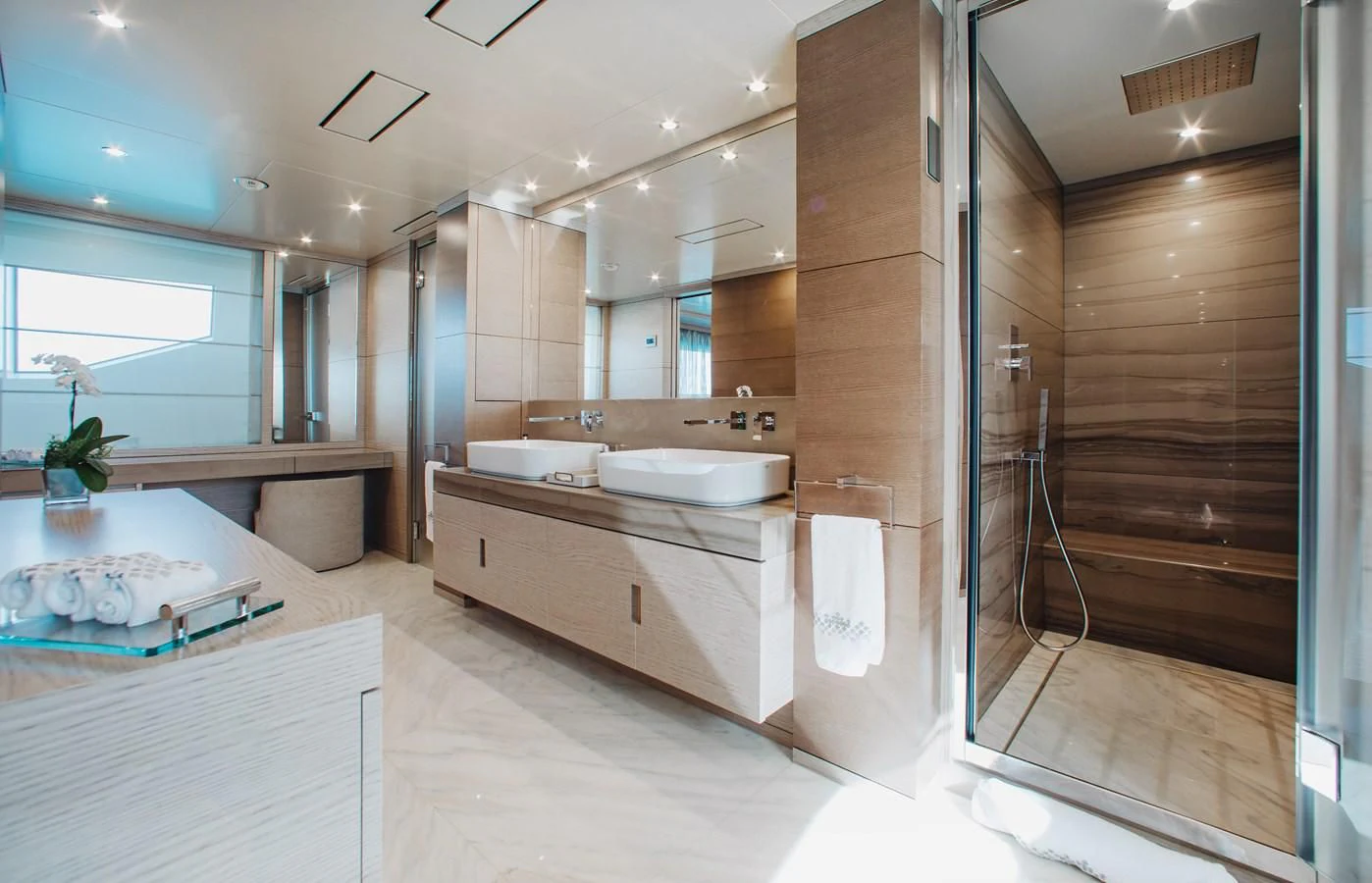 a bathroom with a tub sink and a shower unit aboard COFINA Yacht for Sale