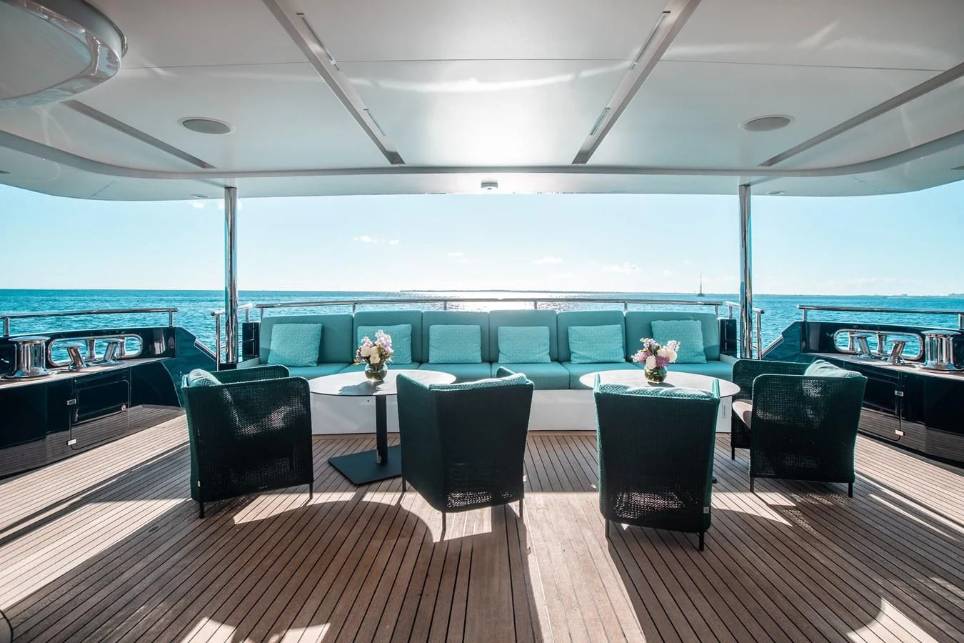 a room with a table and chairs aboard COFINA Yacht for Sale