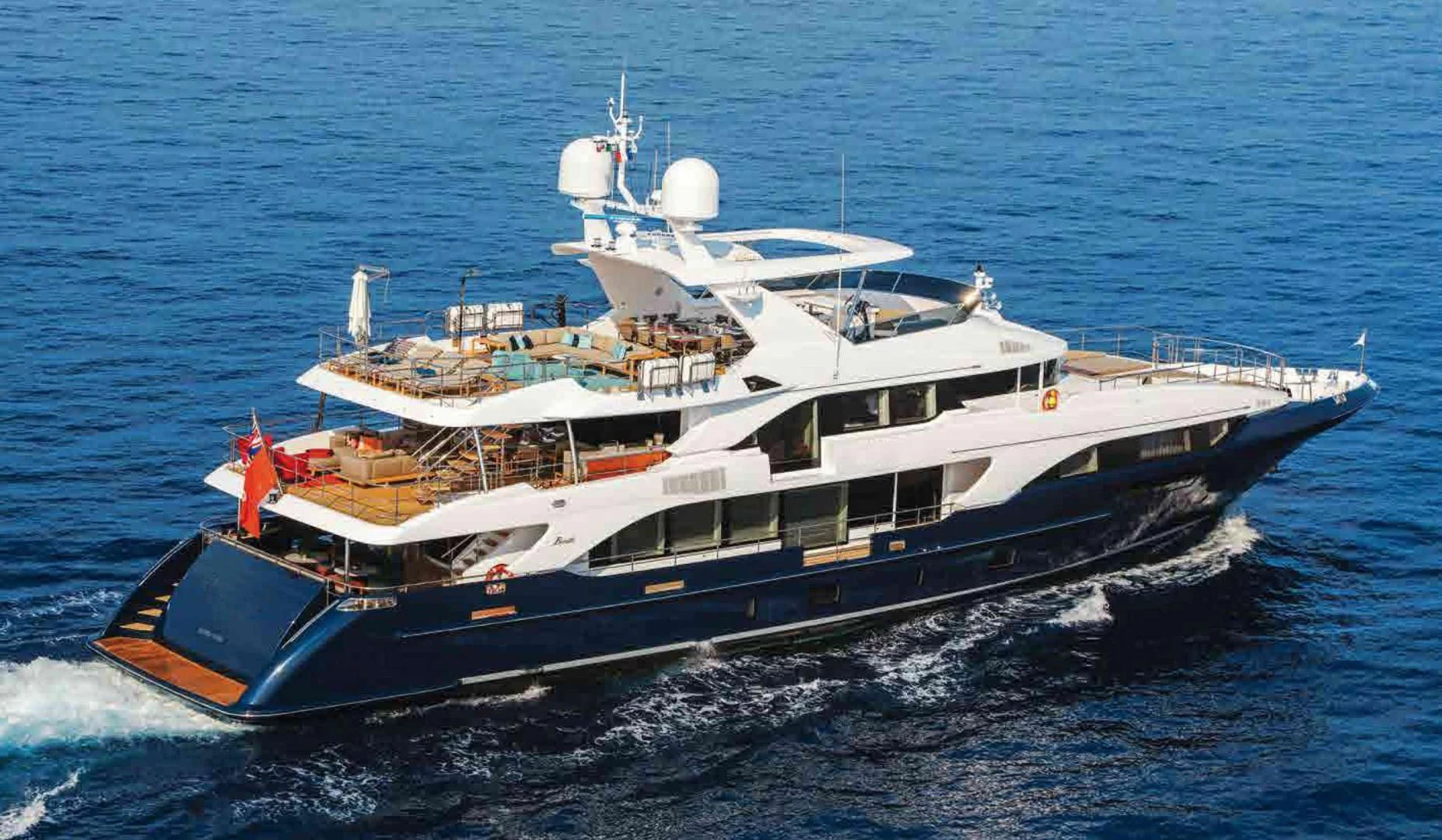 a large ship in the water aboard COFINA Yacht for Sale