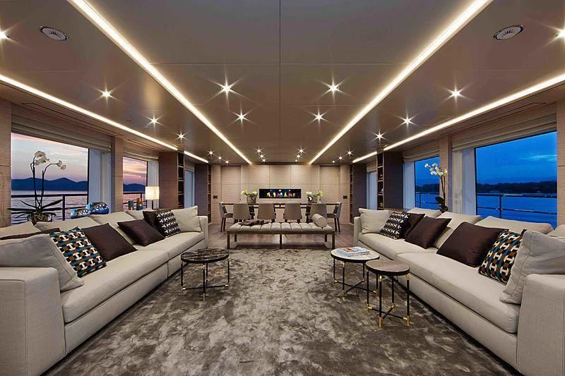 a living room with a large window aboard COFINA Yacht for Sale