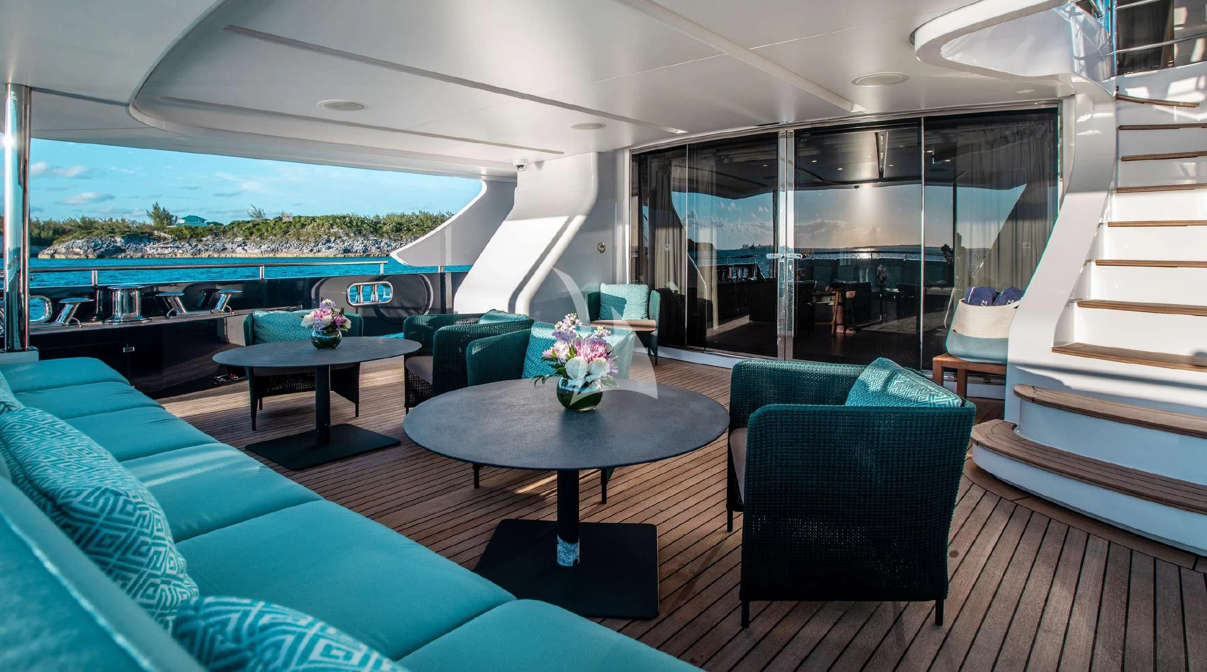 a living room with a large glass window aboard COFINA Yacht for Sale