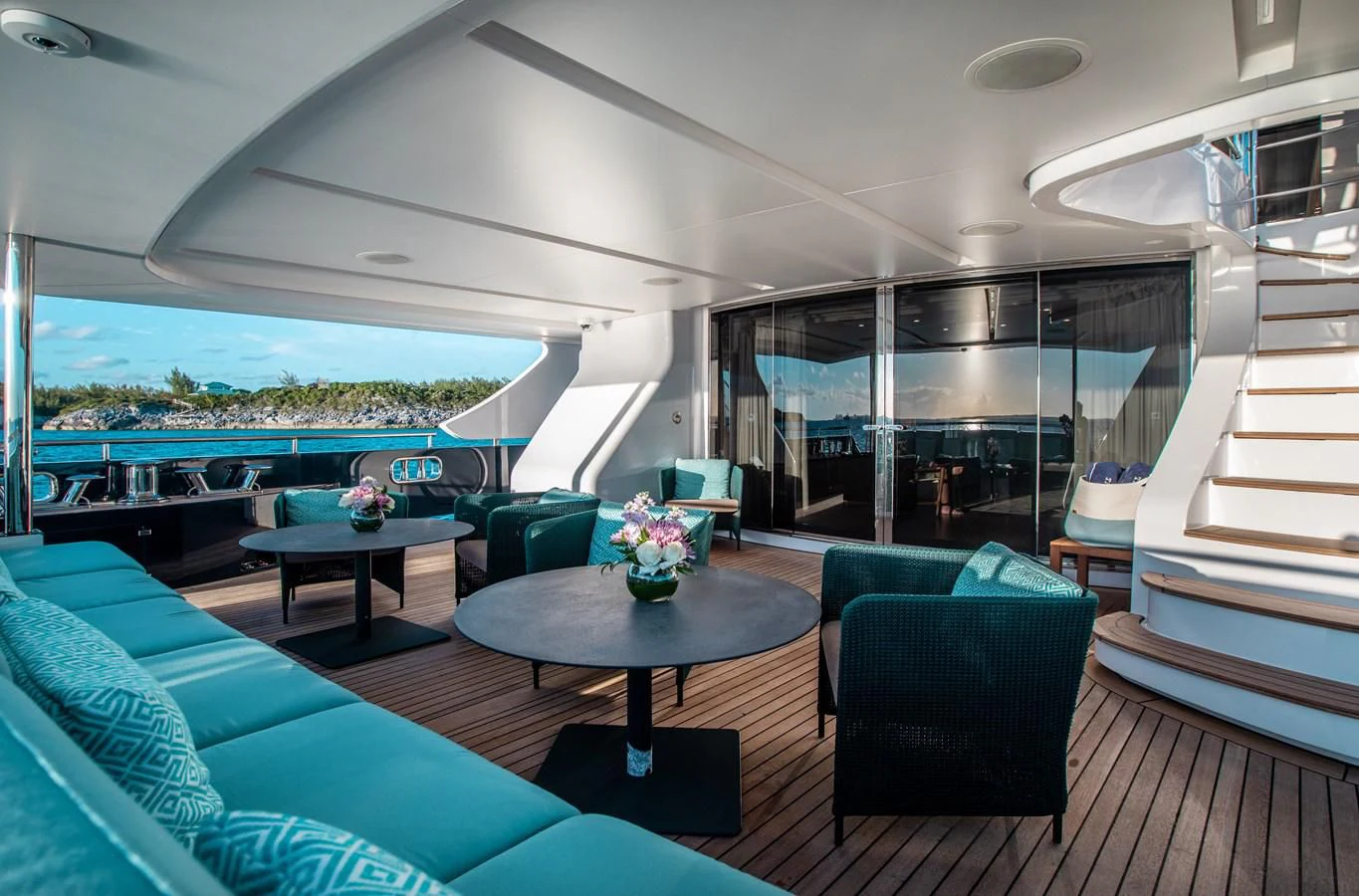 a living room with a large glass window aboard COFINA Yacht for Sale