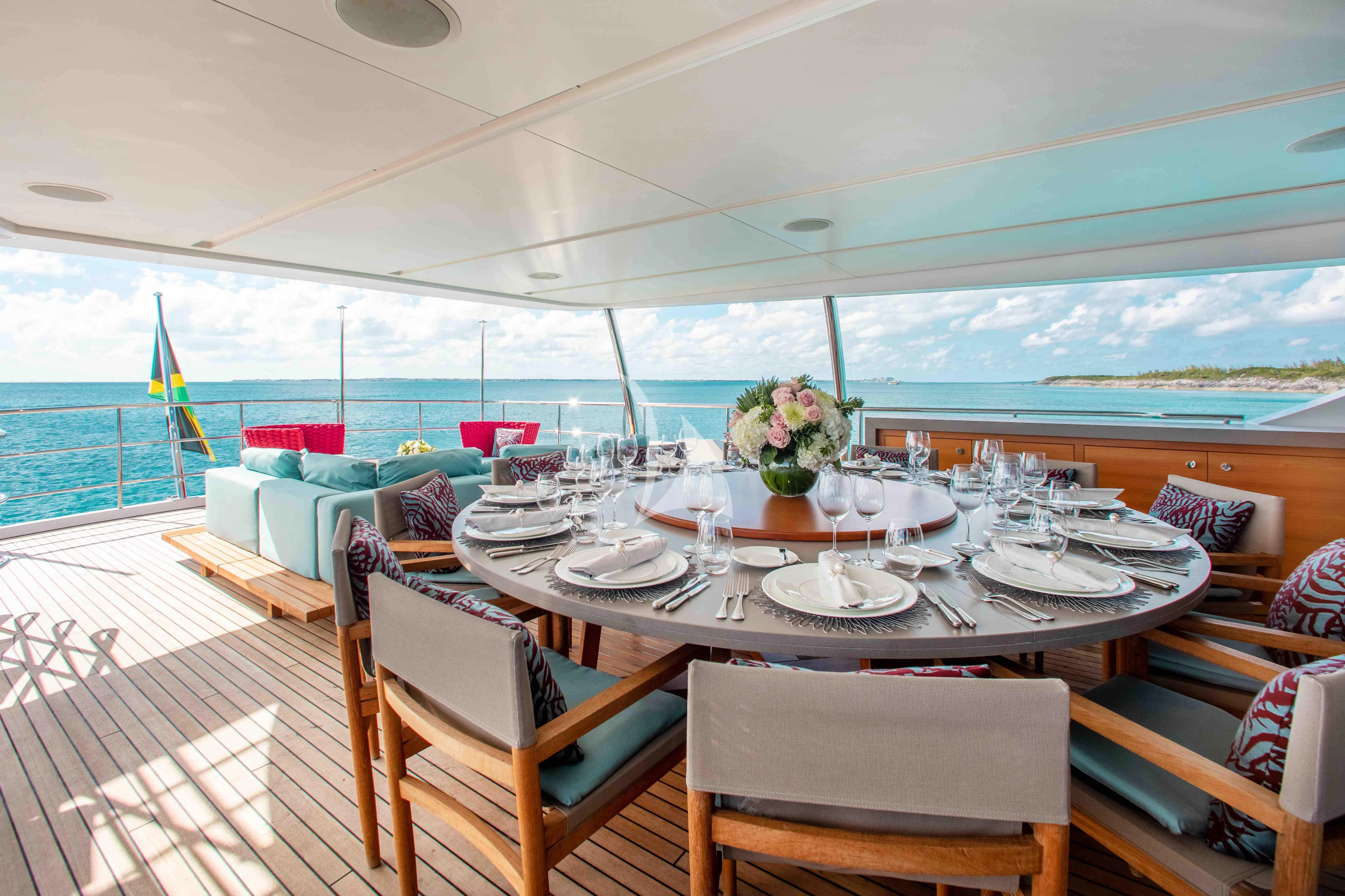 a table set for a meal aboard COFINA Yacht for Sale