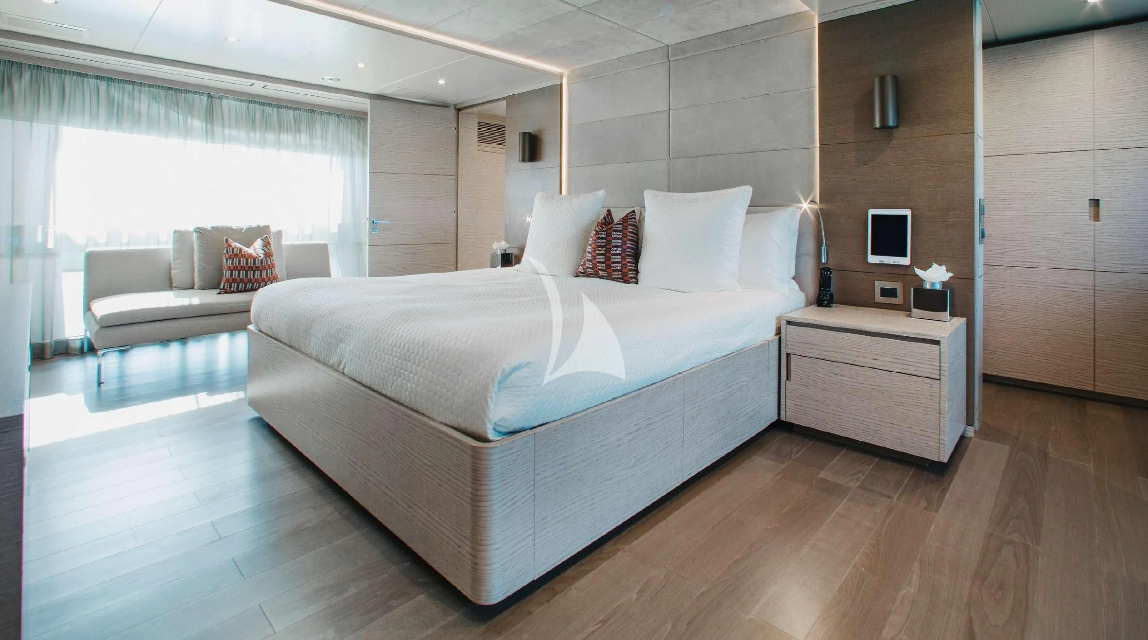 a large bed in a room aboard COFINA Yacht for Sale