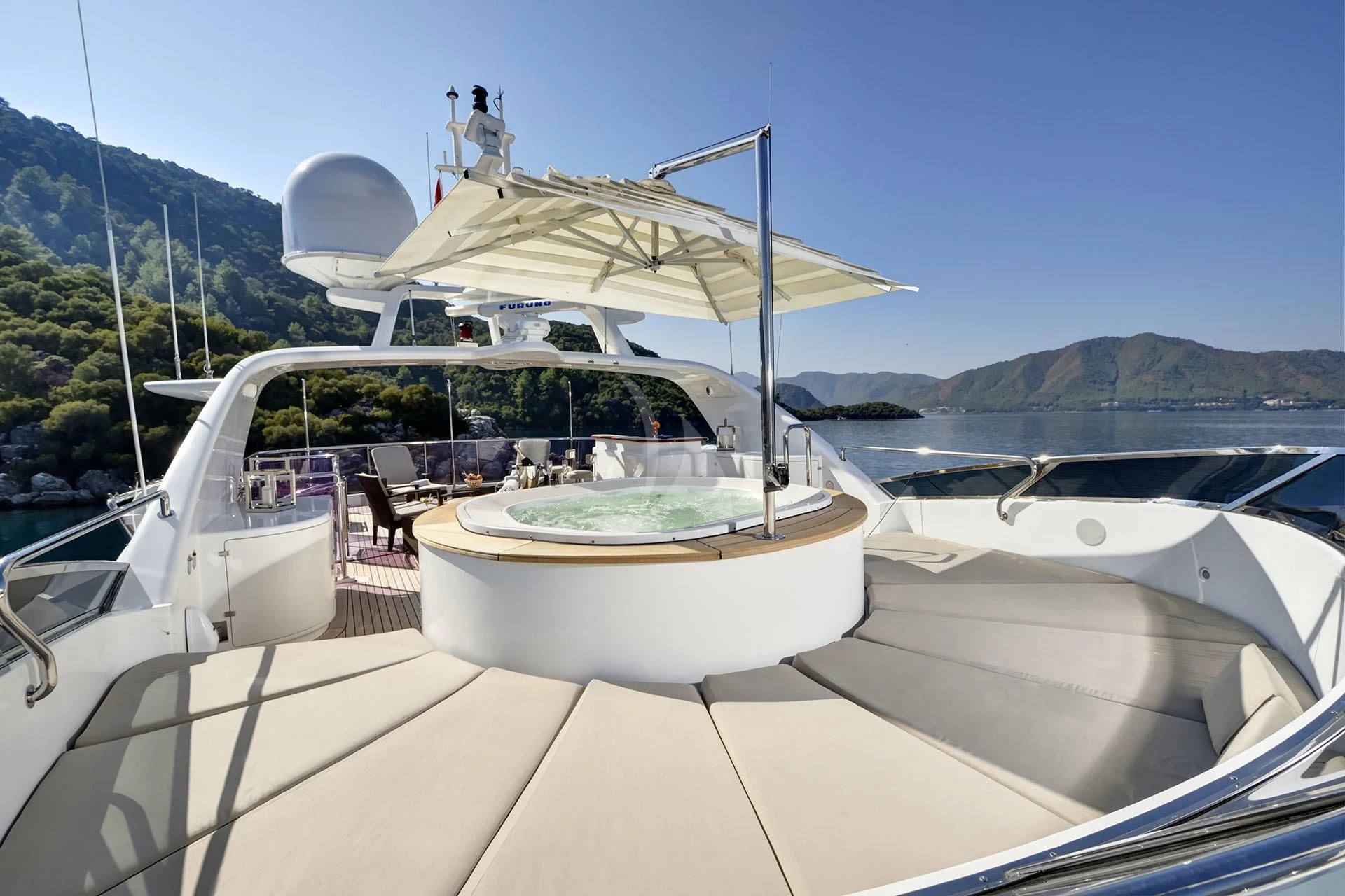 a boat on a deck aboard QUEST R Yacht for Sale