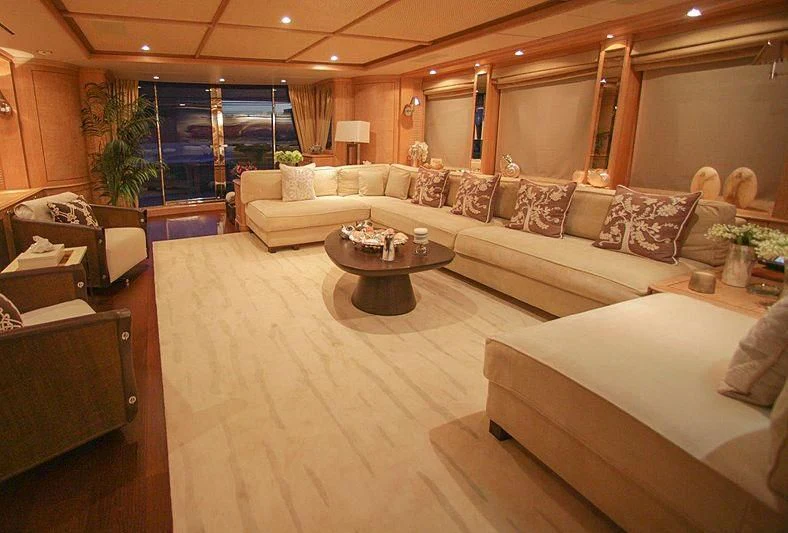 a living room with a large window aboard QUEST R Yacht for Sale