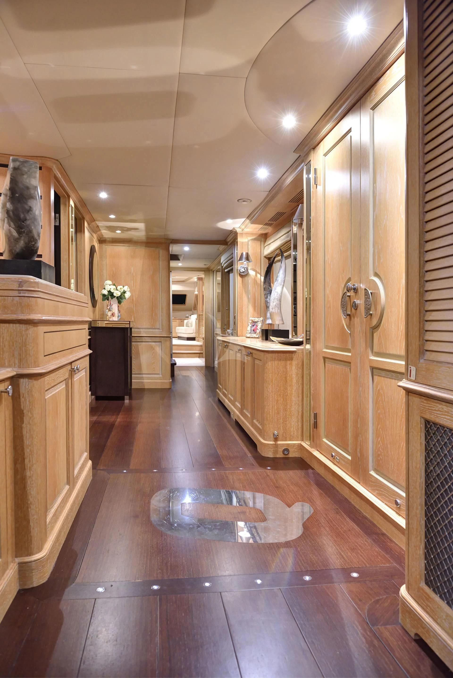 a large wooden hallway aboard QUEST R Yacht for Sale