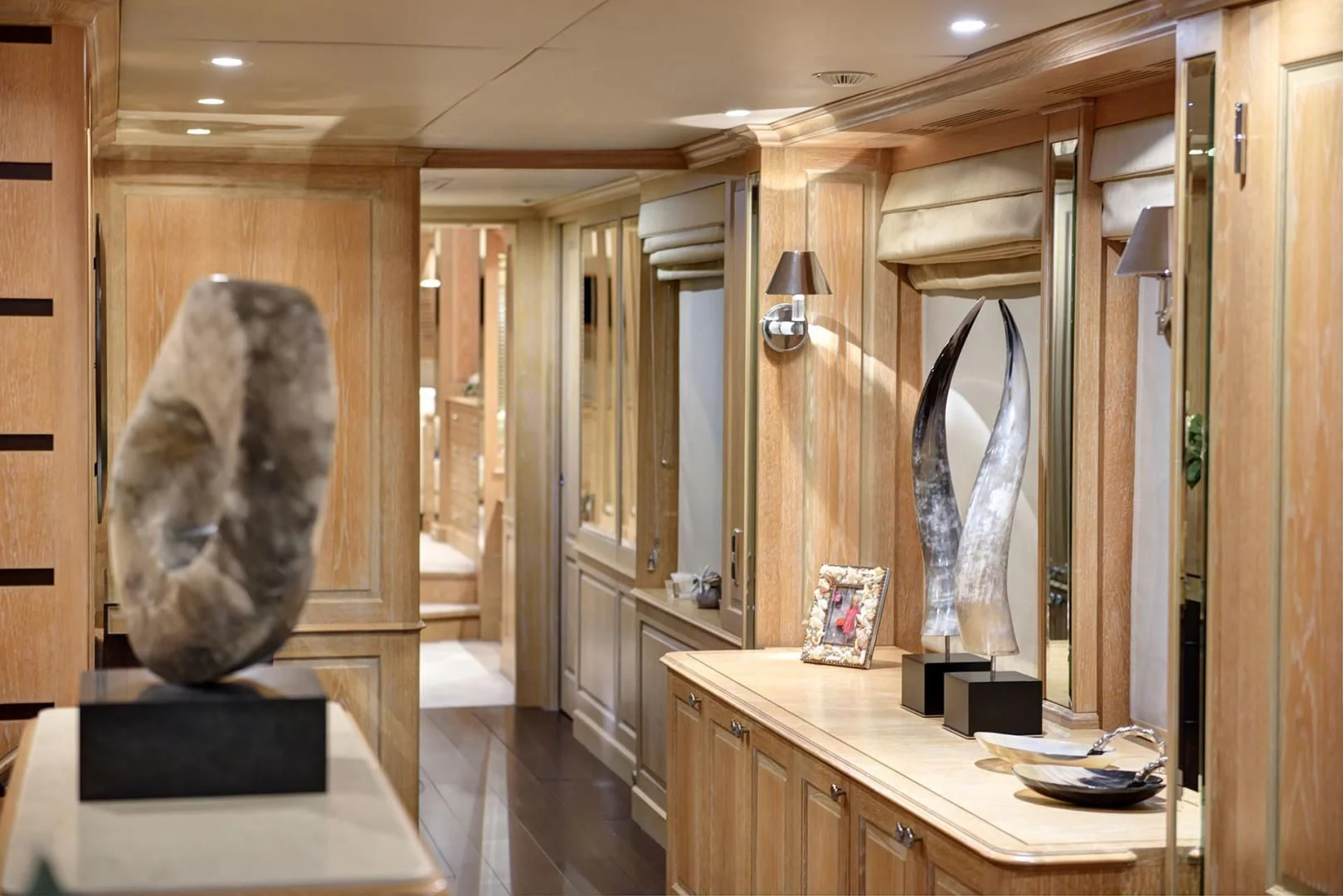 a large bathroom with a large mirror aboard QUEST R Yacht for Sale
