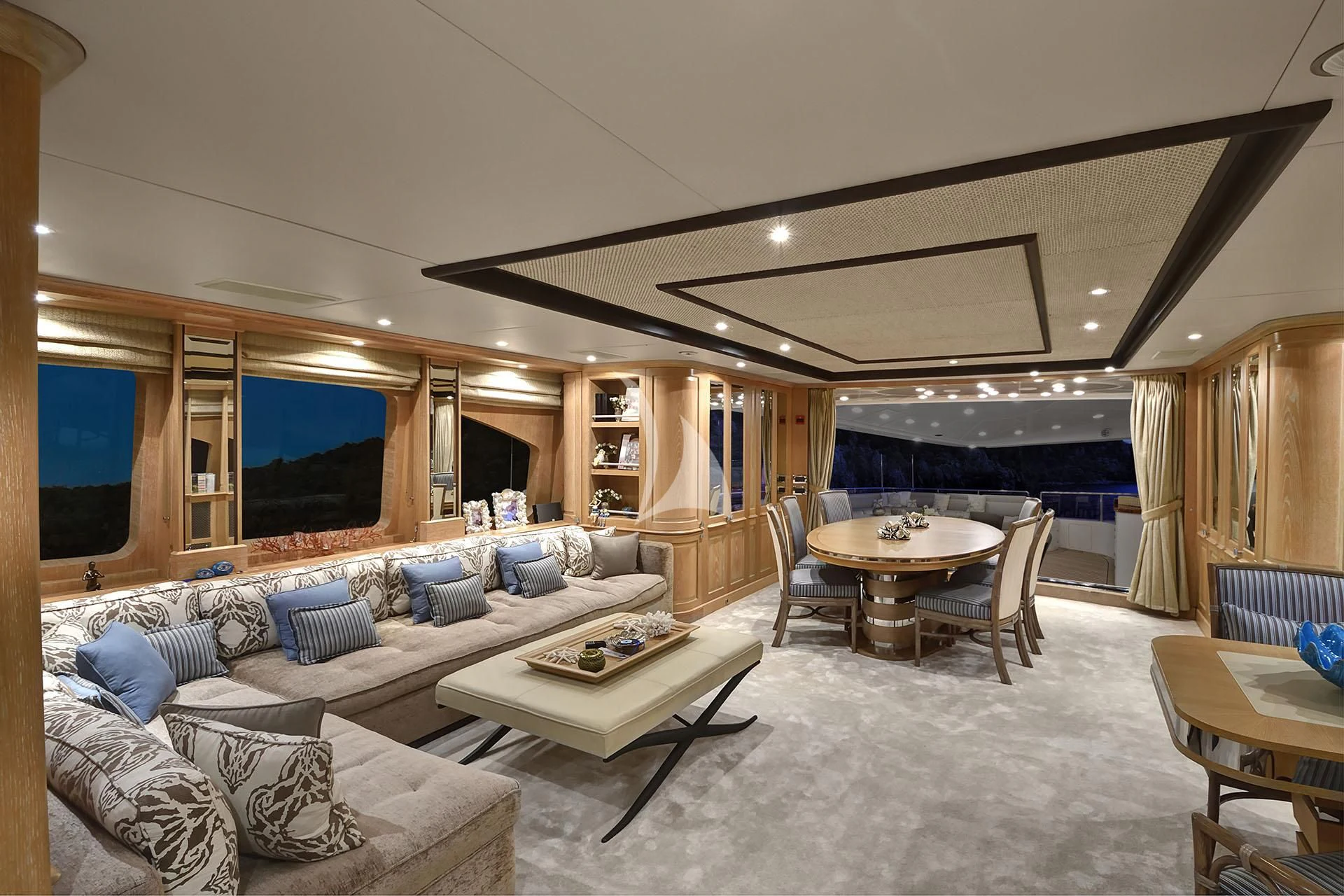 a living room with a large window aboard QUEST R Yacht for Sale