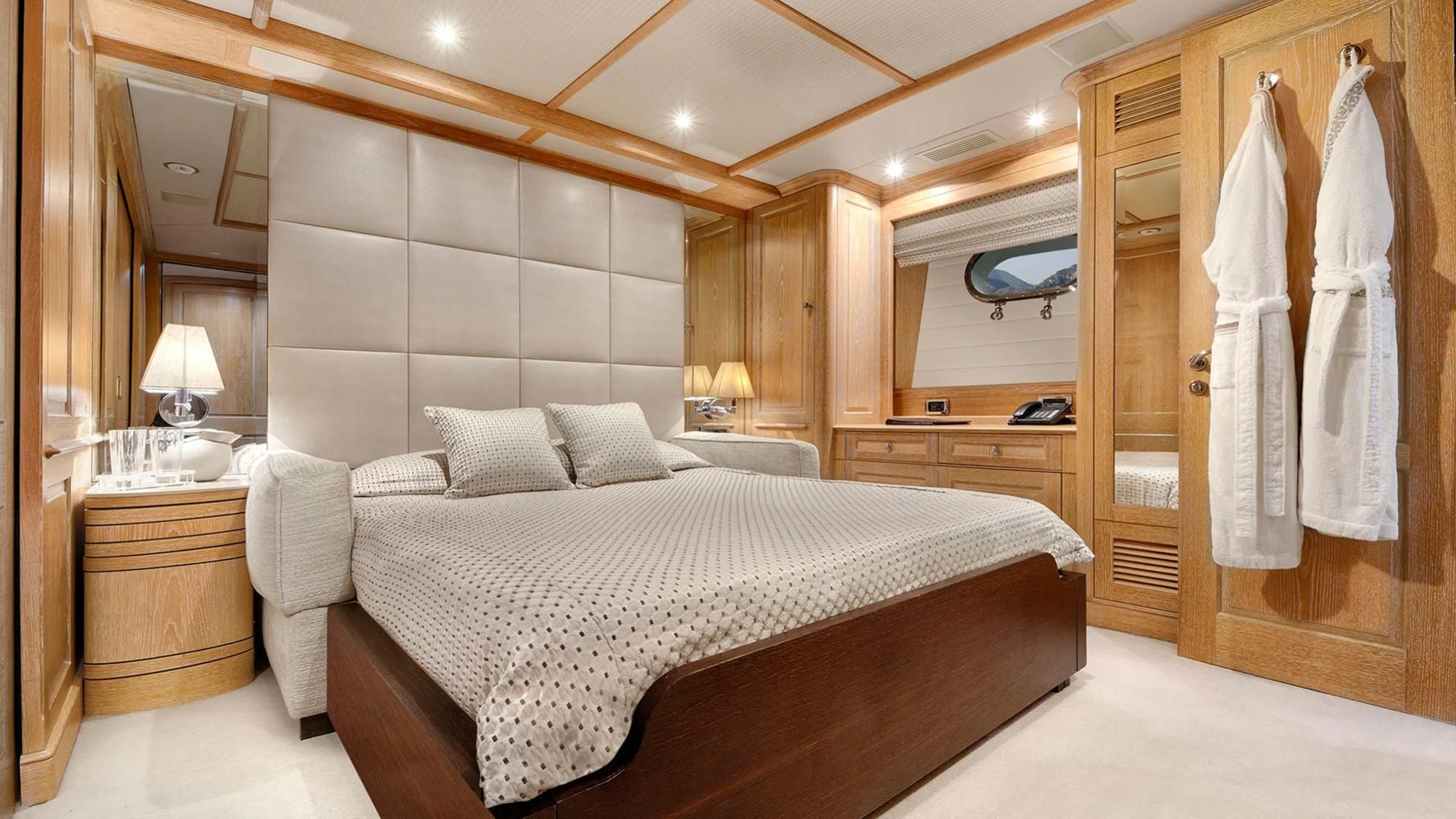 a large bed in a hotel room aboard QUEST R Yacht for Sale