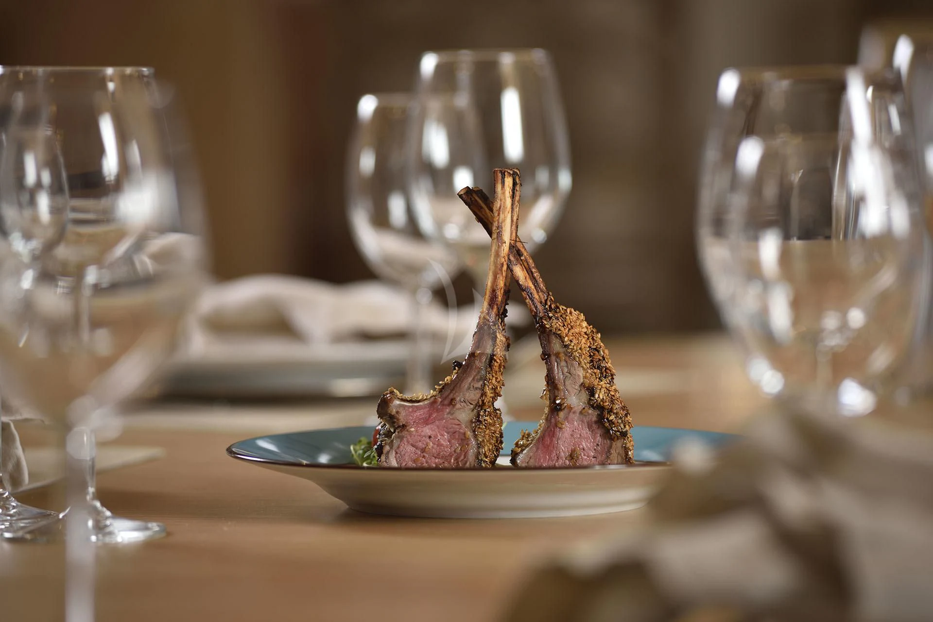 a small statue on a plate aboard QUEST R Yacht for Sale