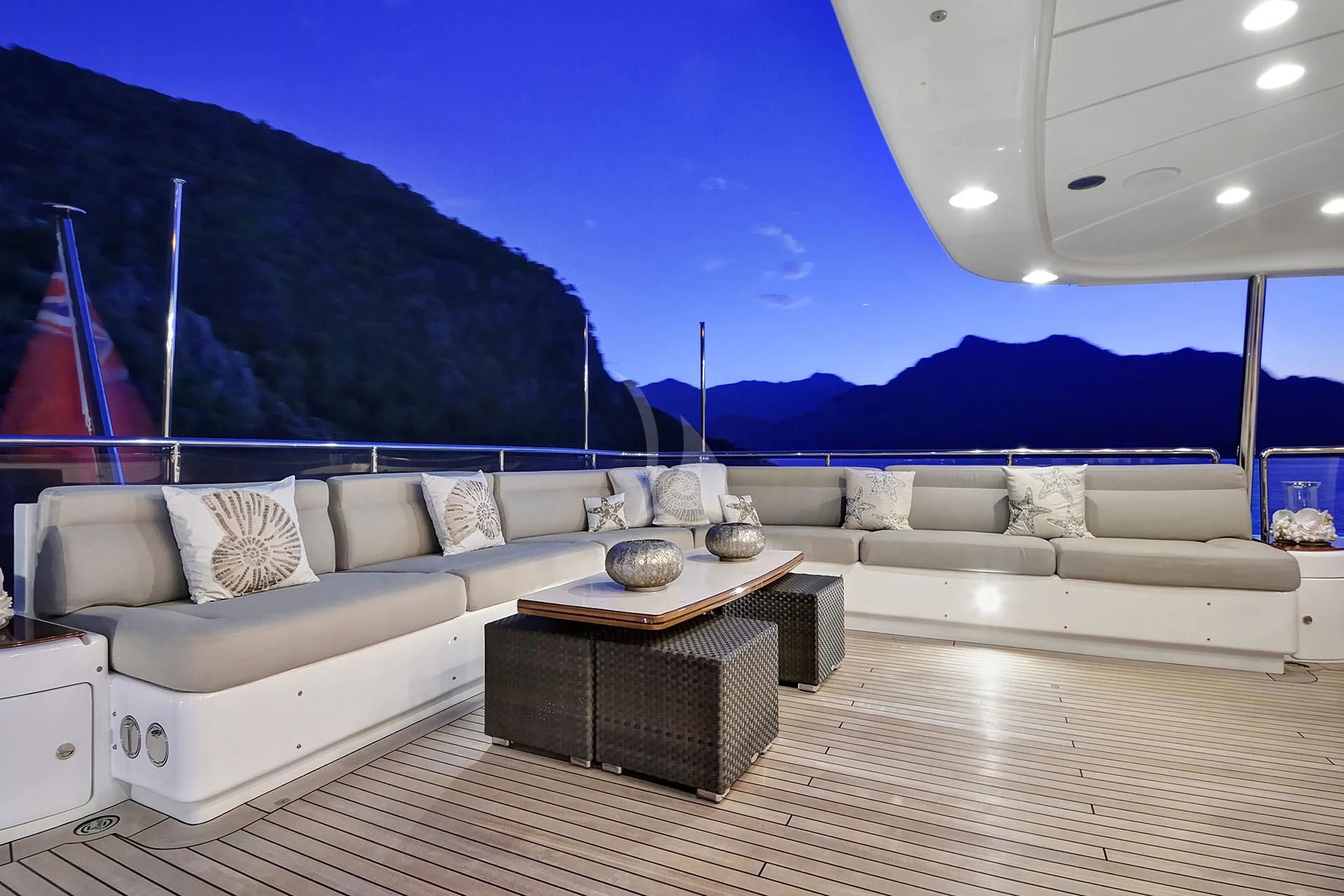 a living room with a large painting aboard QUEST R Yacht for Sale
