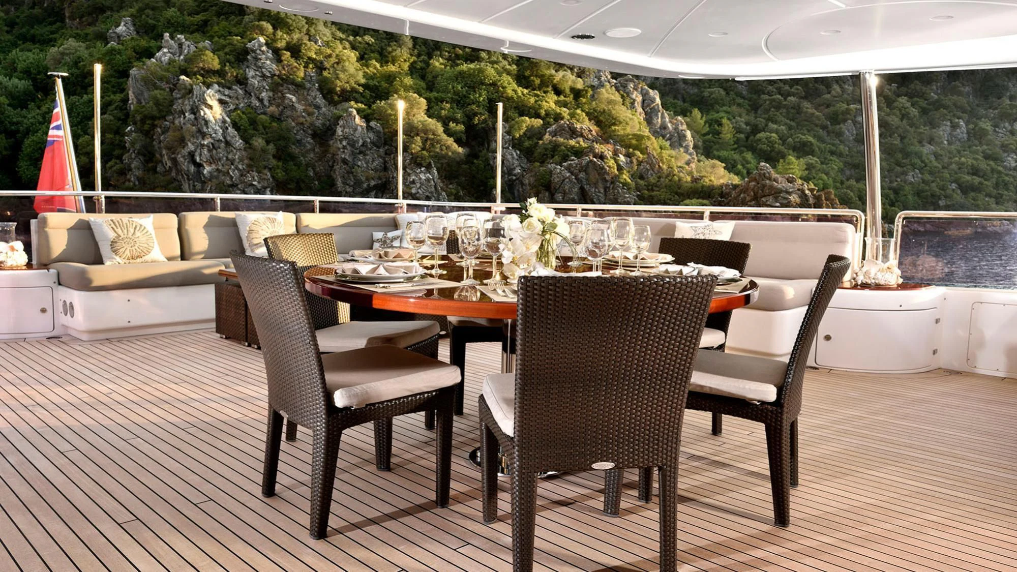 a table and chairs in a room aboard QUEST R Yacht for Sale