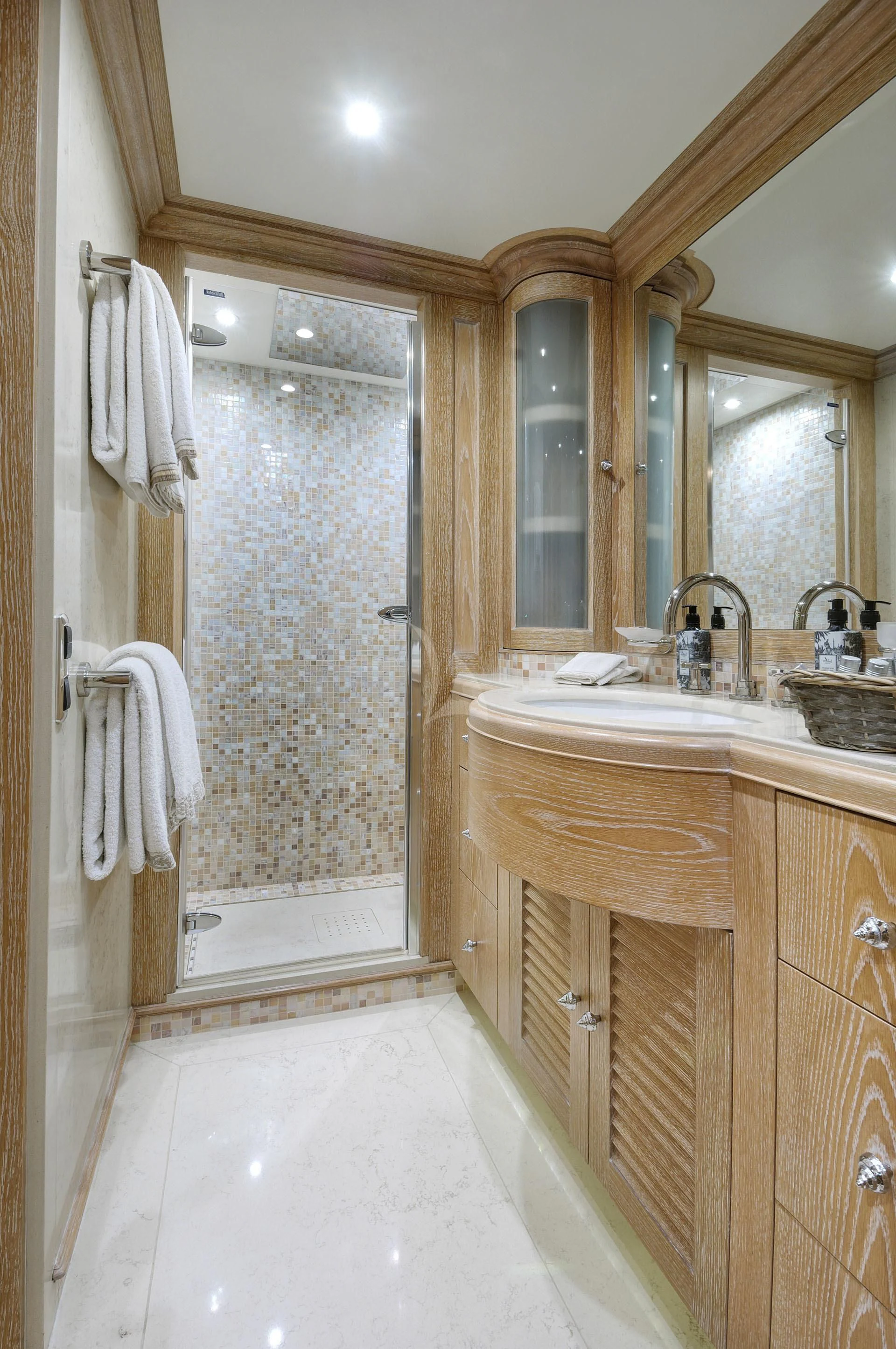 a bathroom with a sink and a bathtub aboard QUEST R Yacht for Sale