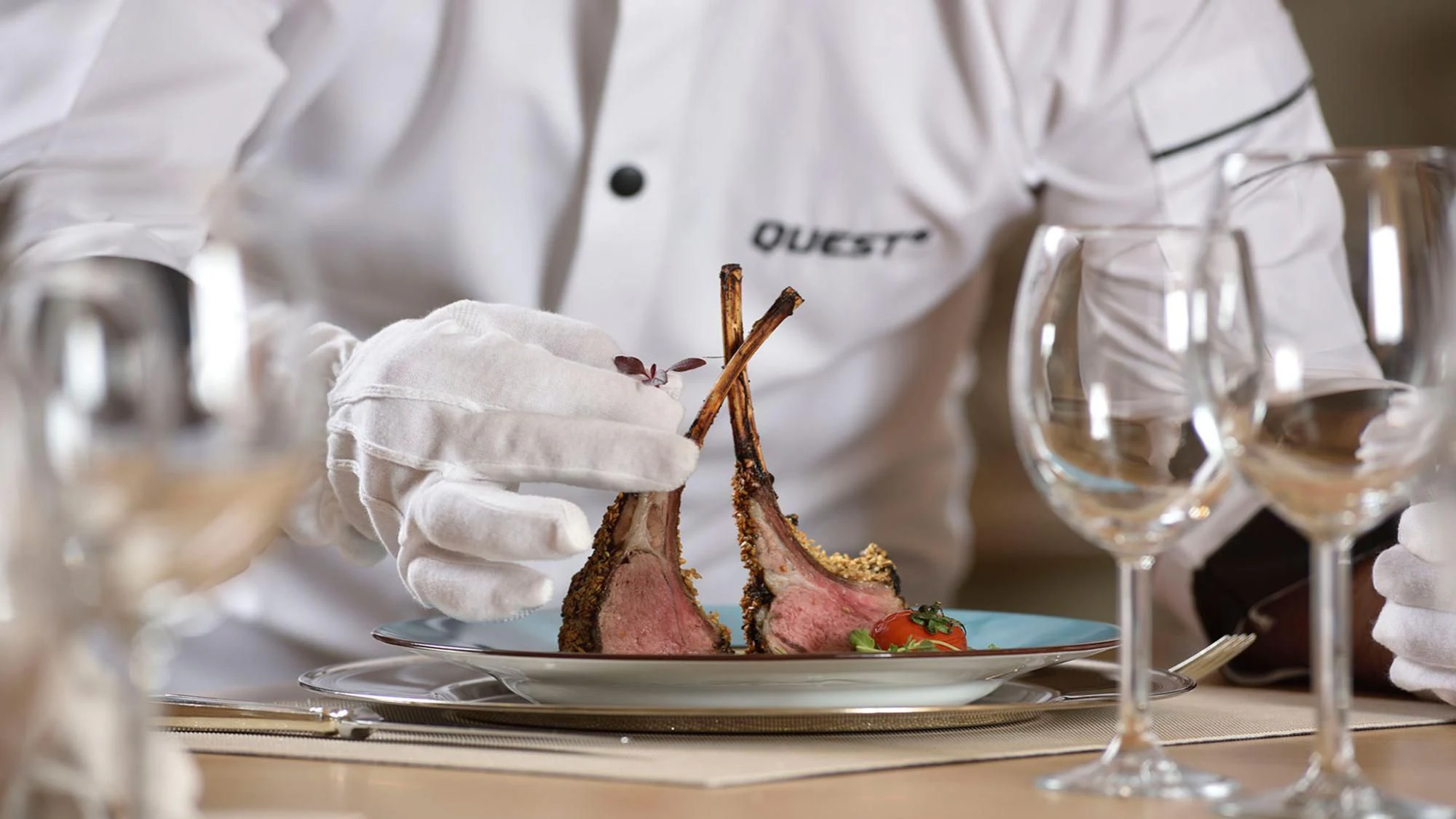 a dessert on a plate aboard QUEST R Yacht for Sale