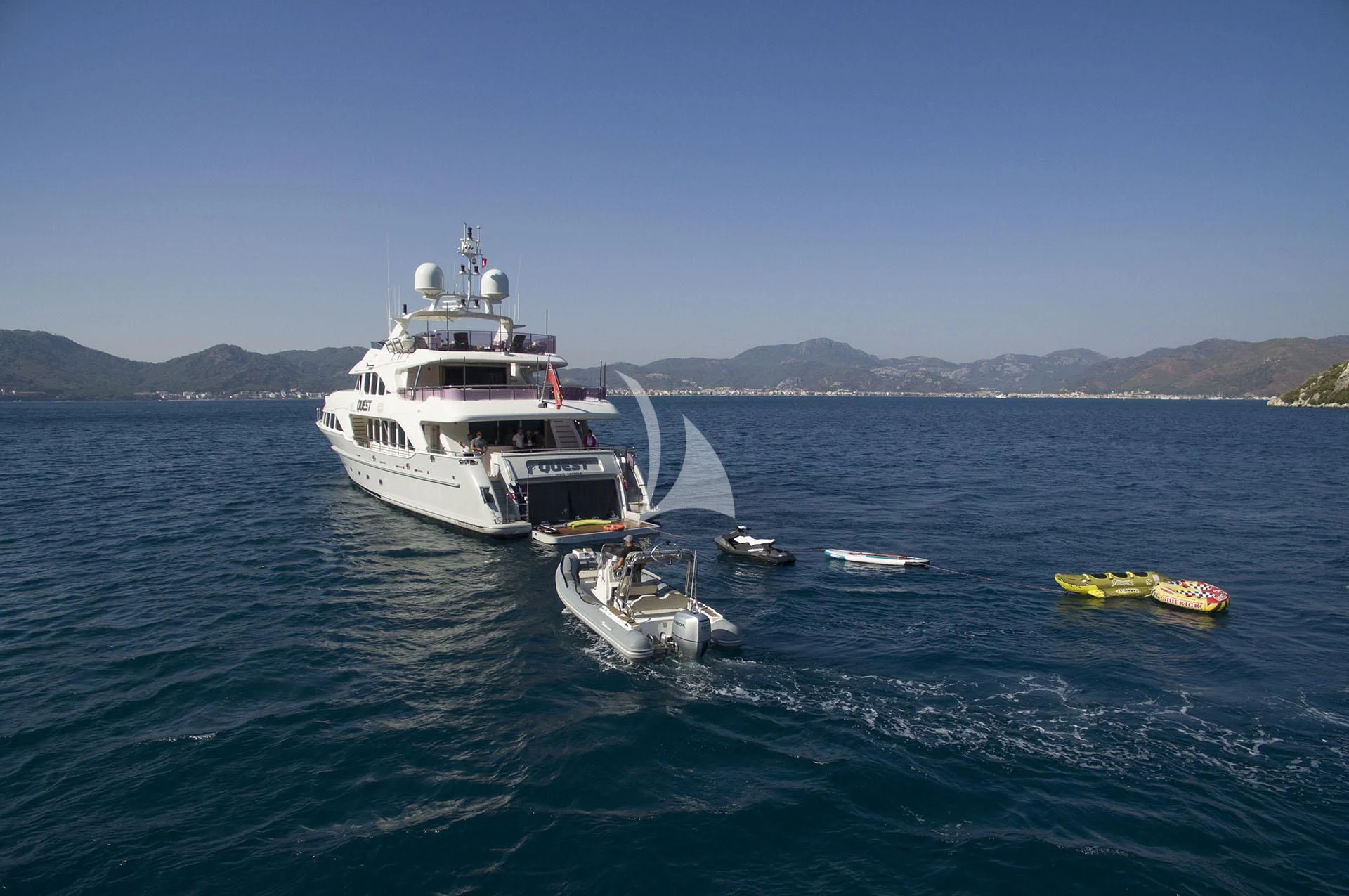 a boat on the water aboard QUEST R Yacht for Sale