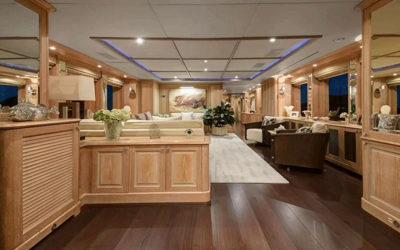 a kitchen with wooden cabinets aboard QUEST R Yacht for Sale
