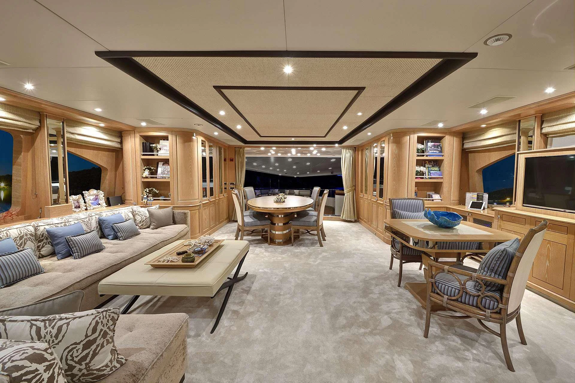 a living room with a large open floor plan aboard QUEST R Yacht for Sale