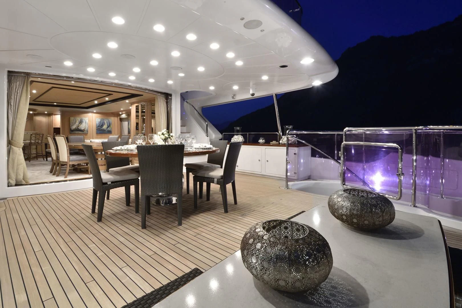 a room with a table and chairs aboard QUEST R Yacht for Sale