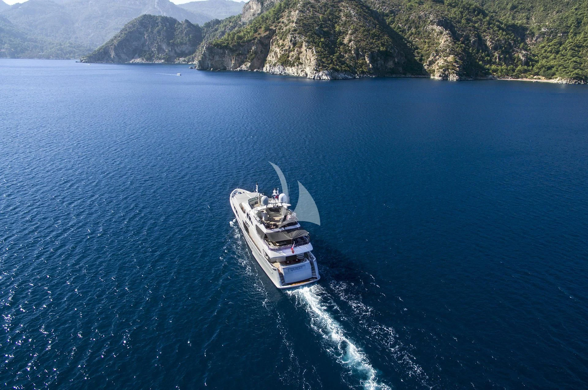 a boat on the water aboard QUEST R Yacht for Sale