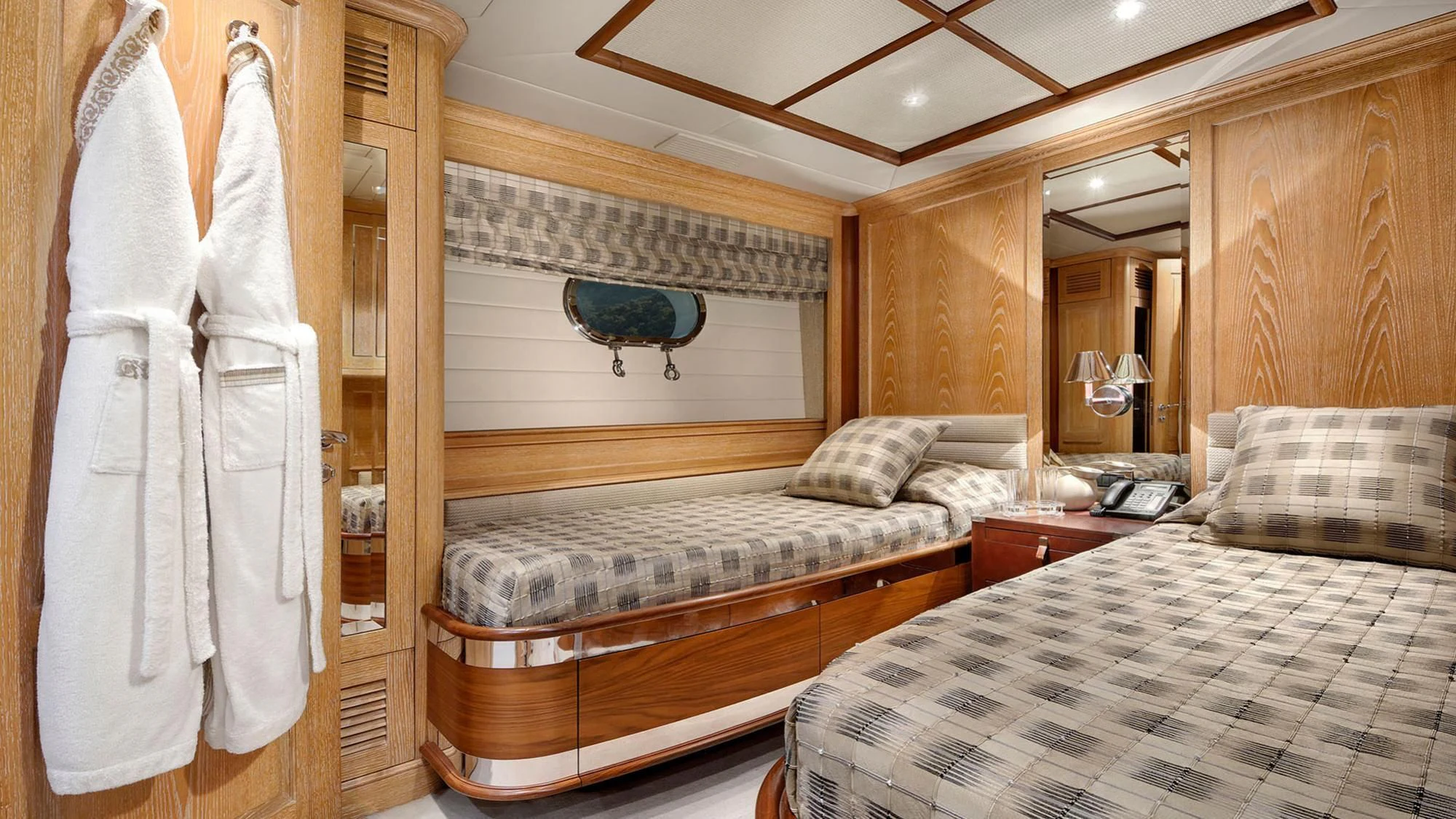 a couple of beds in a hotel room aboard QUEST R Yacht for Sale