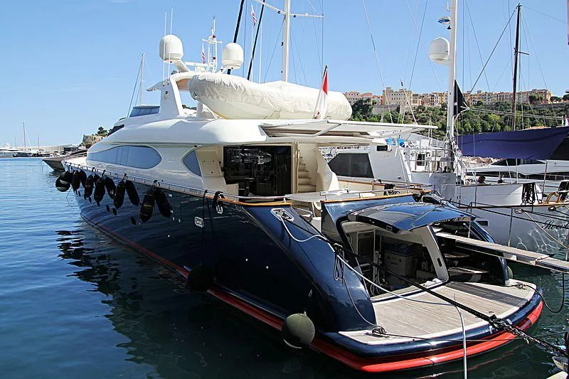 a boat docked at a pier aboard ESCAPE II Yacht for Sale