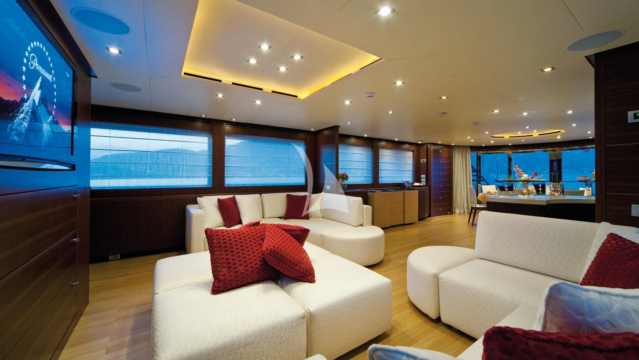 a living room with a large window aboard SOIREE Yacht for Sale