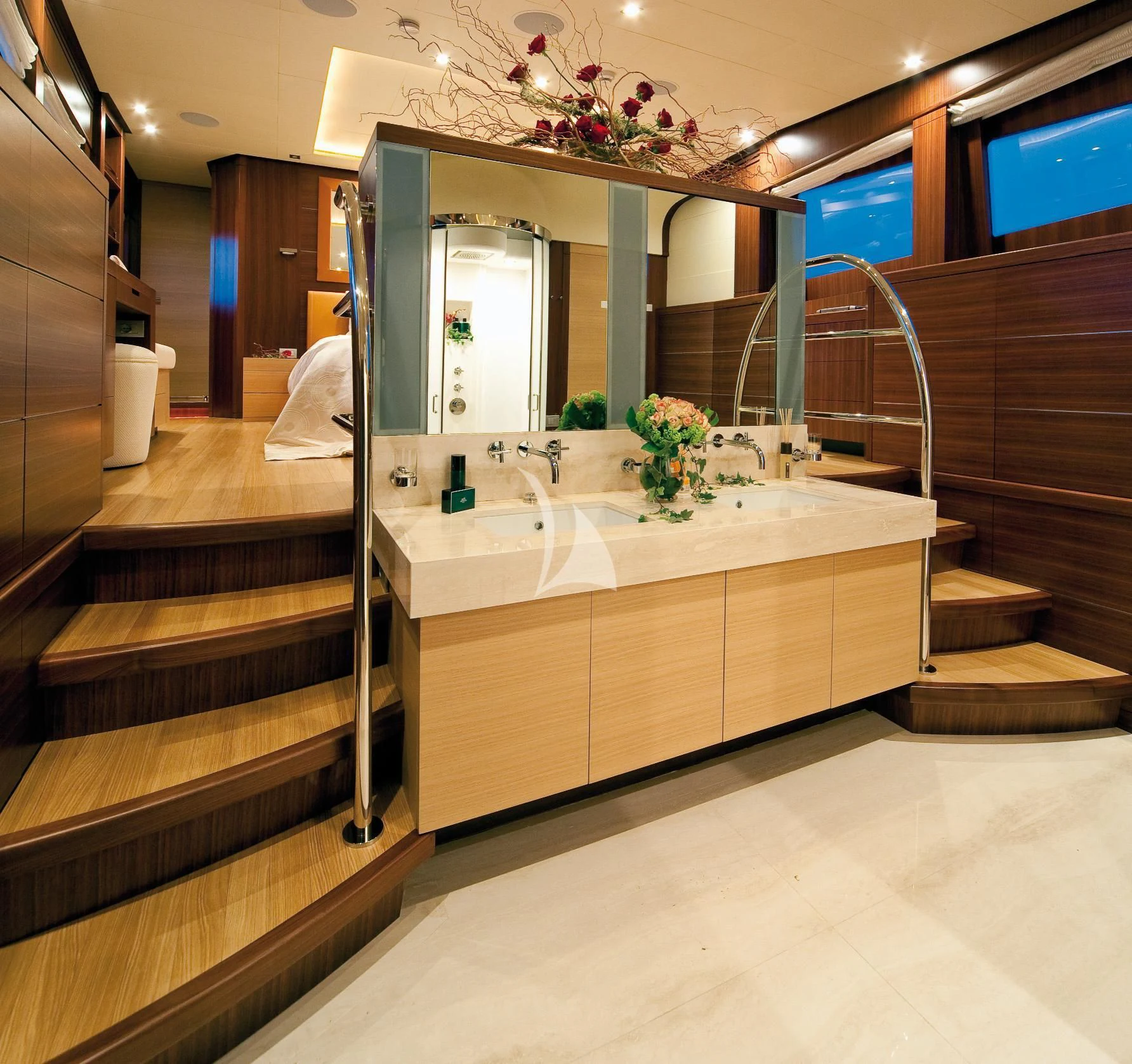 a bathroom with a large mirror aboard SOIREE Yacht for Sale