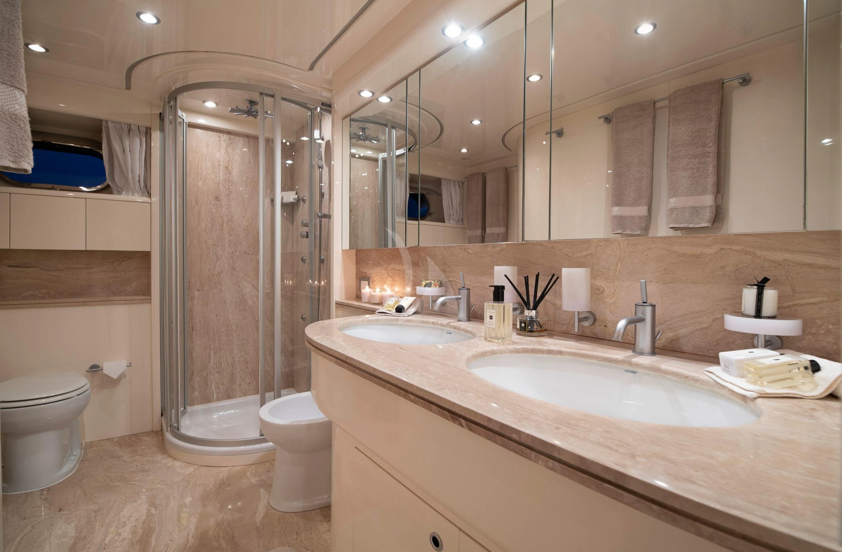 a bathroom with a glass shower aboard IRENE'S Yacht for Sale