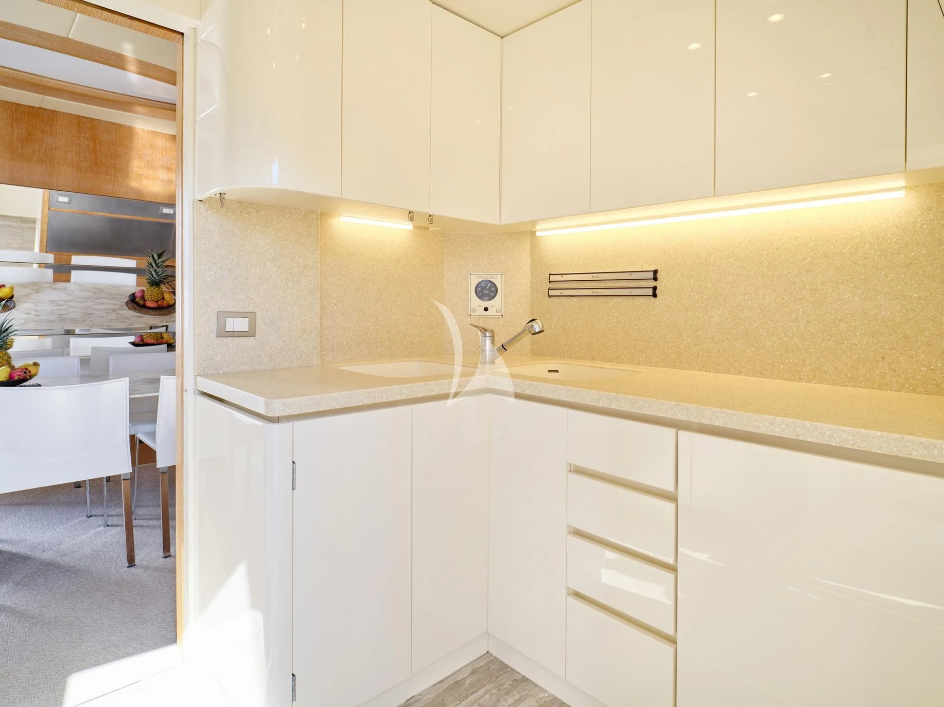 a kitchen with white cabinets aboard IRENE'S Yacht for Sale