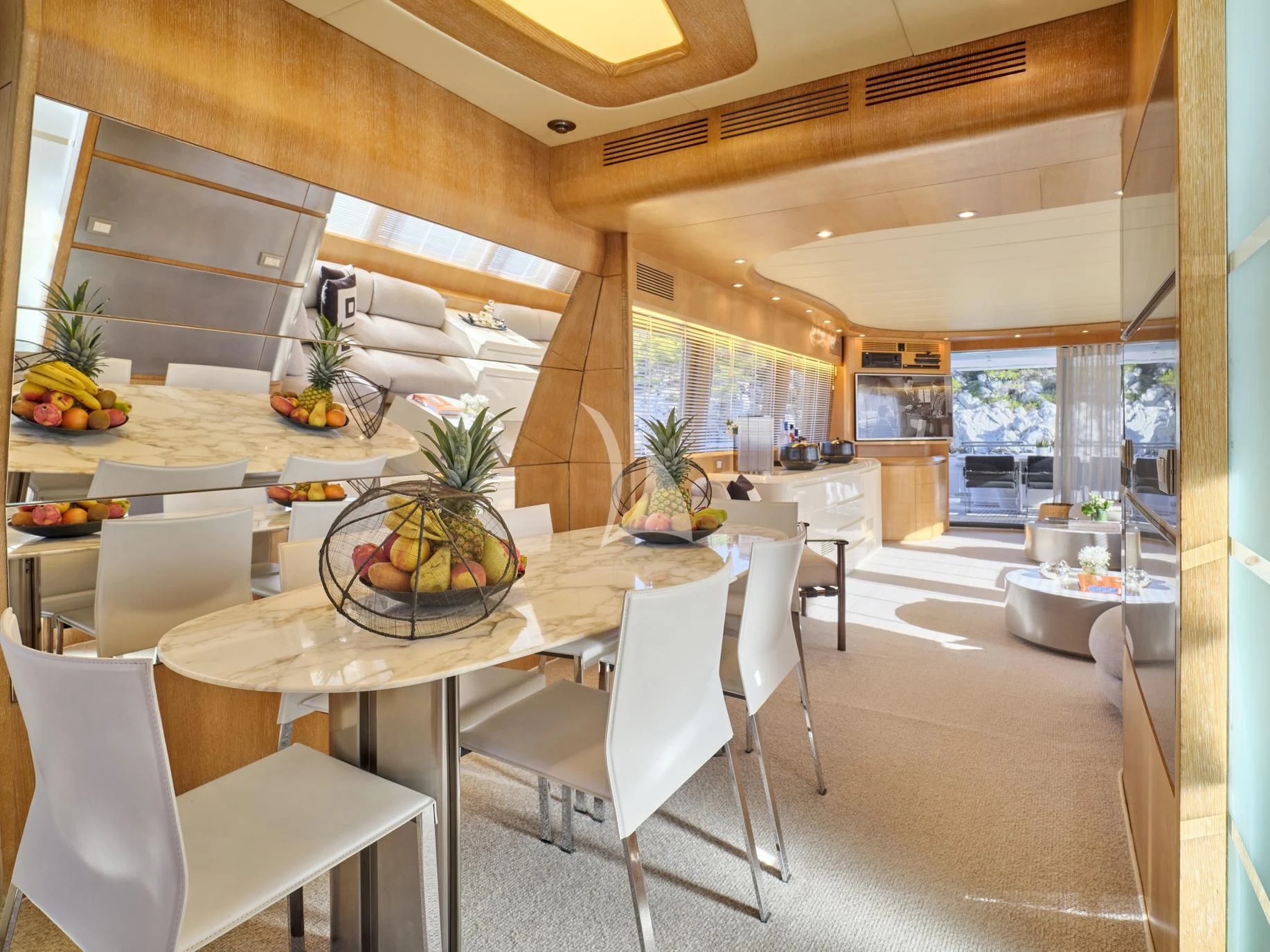 a kitchen with a table and chairs aboard IRENE'S Yacht for Sale