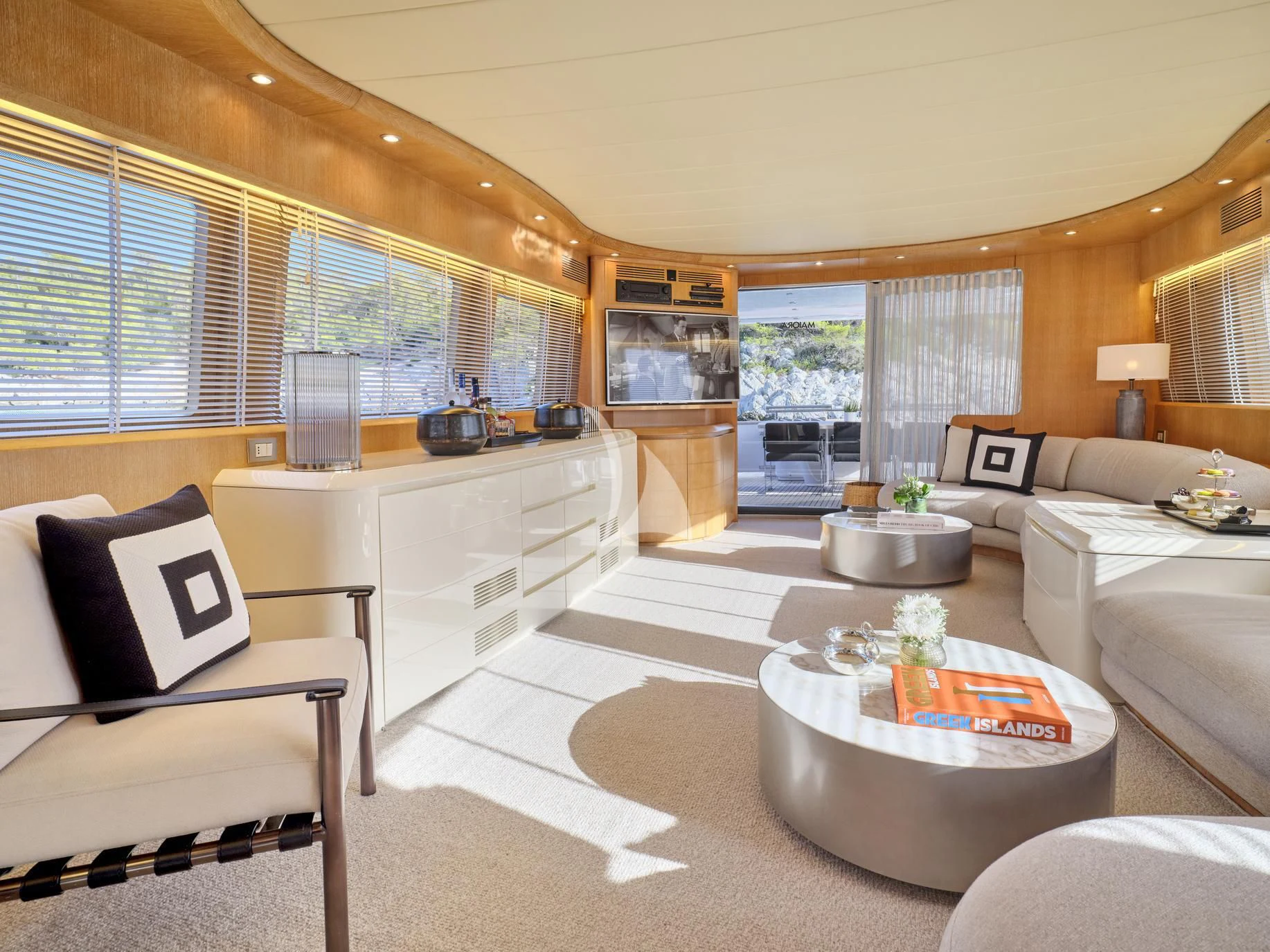 a living room with a large window aboard IRENE'S Yacht for Sale