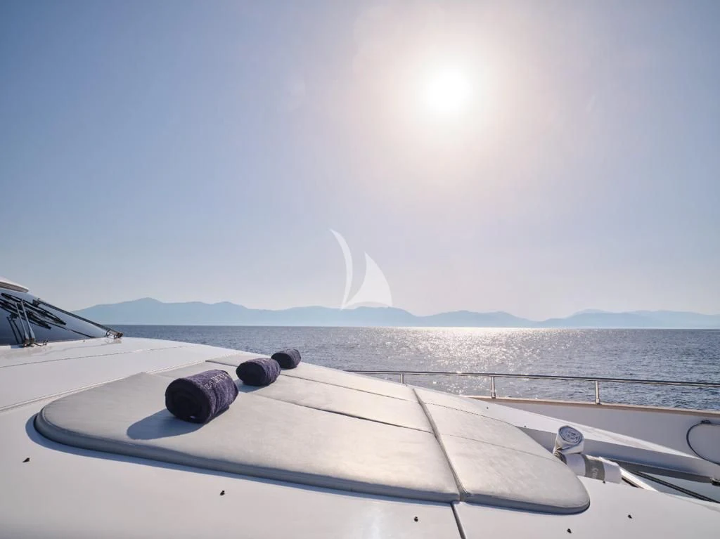 a boat with a water fountain in the background aboard IRENE'S Yacht for Sale