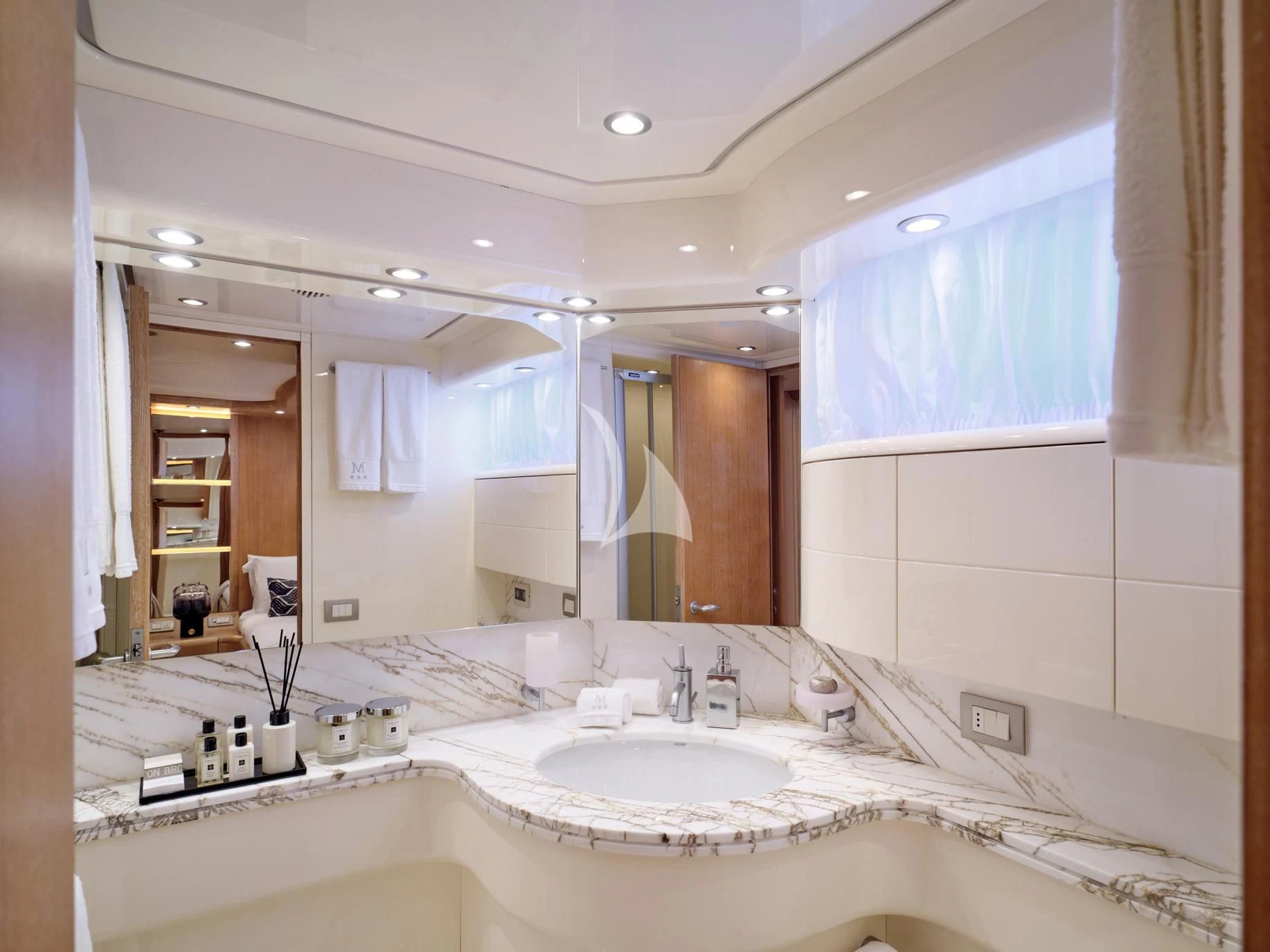 a bathroom with a large mirror aboard IRENE'S Yacht for Sale