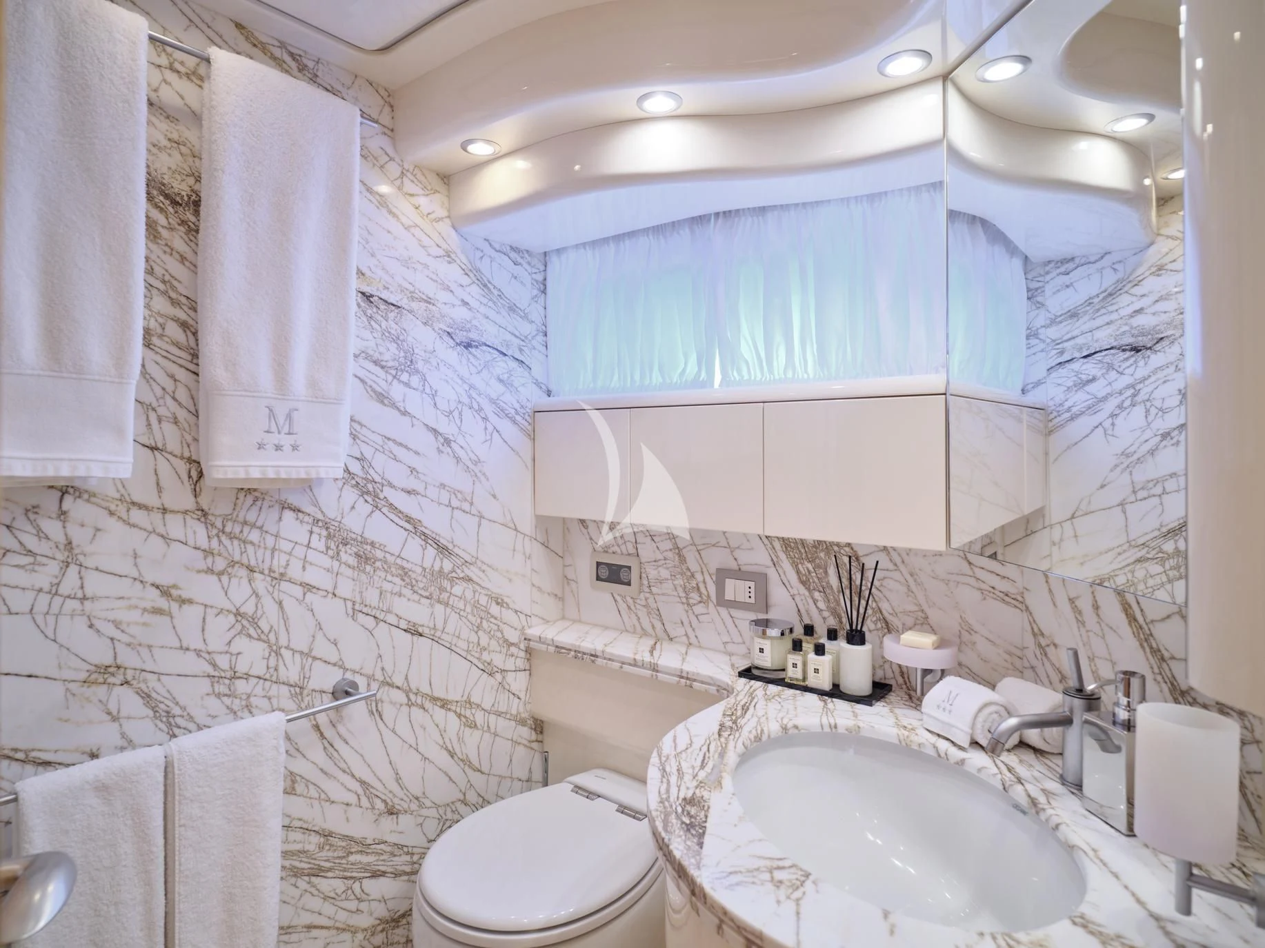 a bathroom with a sink and toilet aboard IRENE'S Yacht for Sale