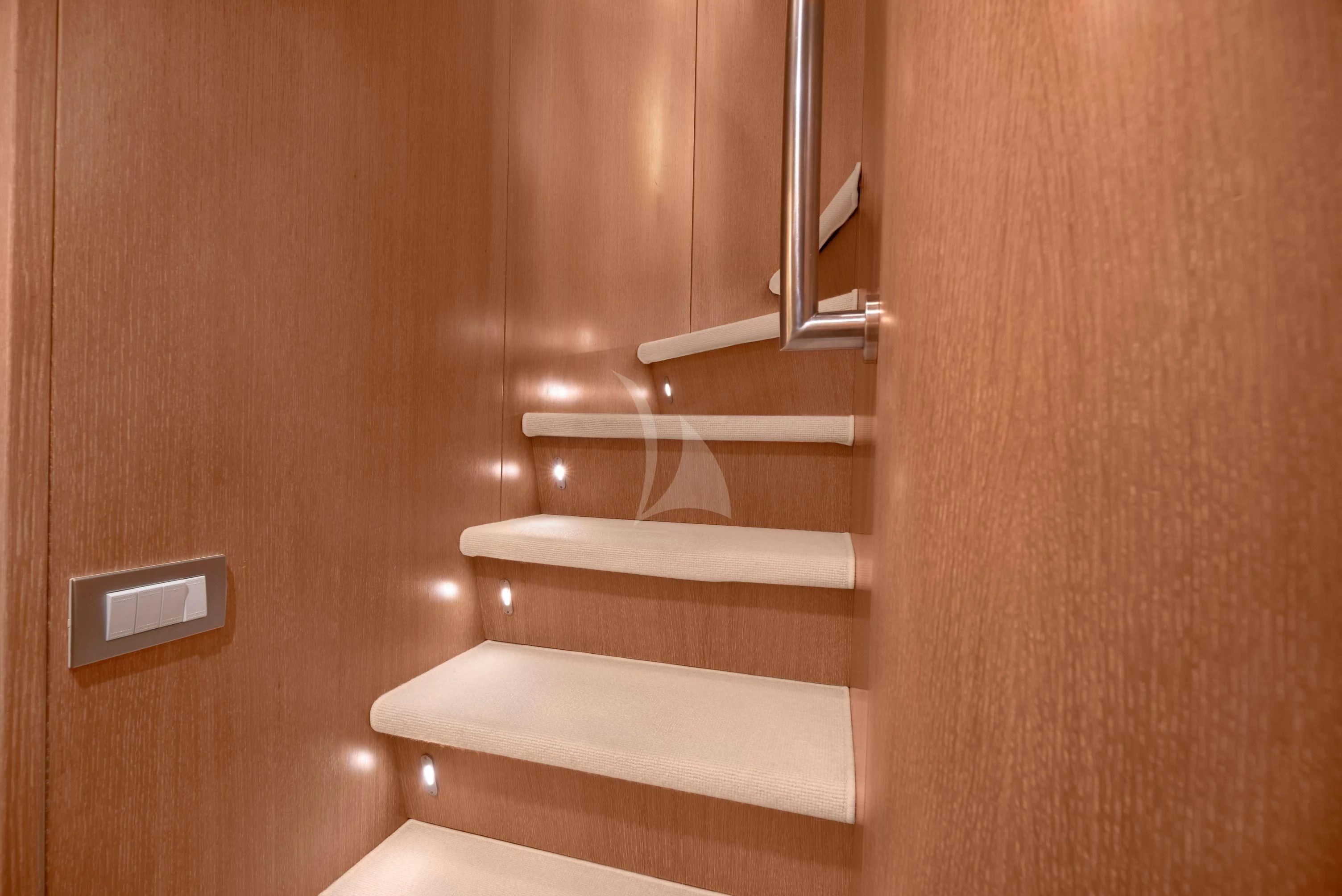 a wooden door with a white toilet aboard IRENE'S Yacht for Sale