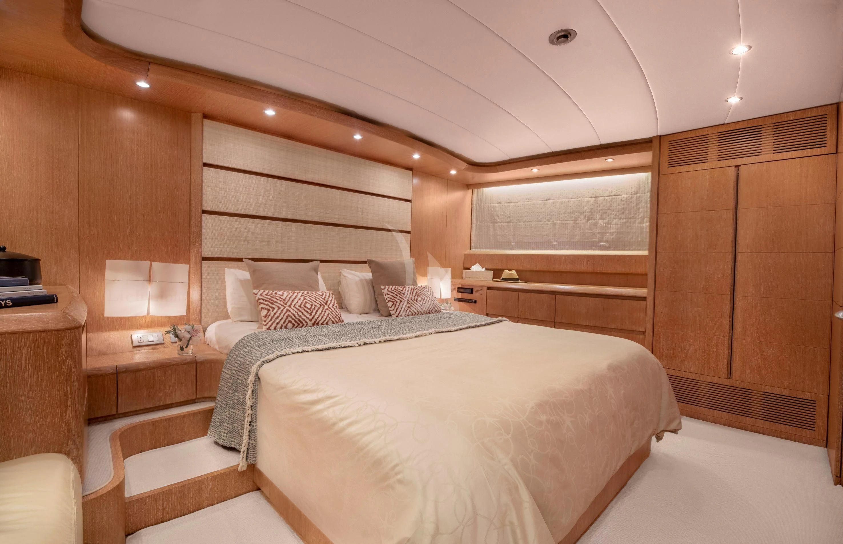 a room with a bed and a wood wall aboard IRENE'S Yacht for Sale