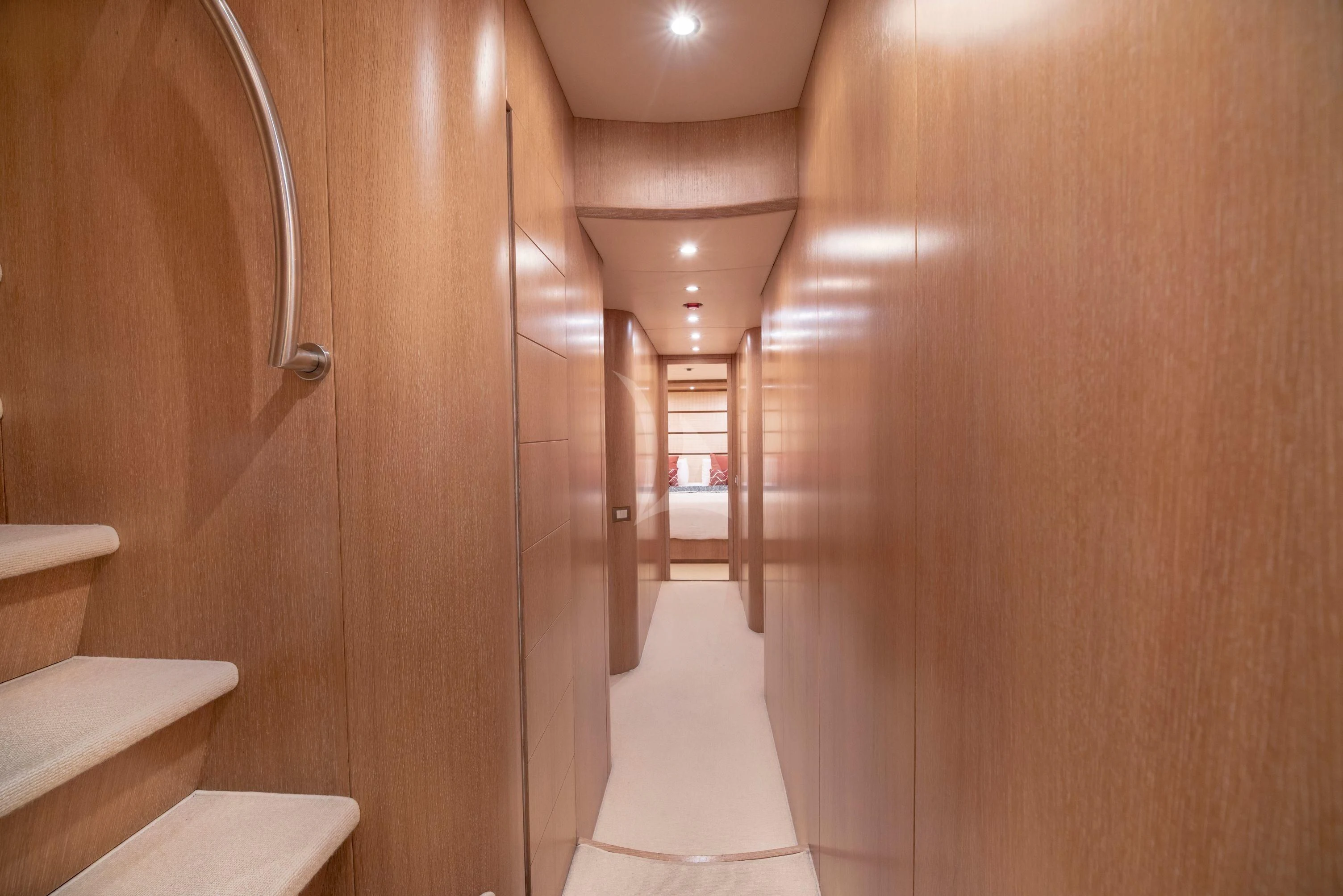 a bathroom with a wood door aboard IRENE'S Yacht for Sale
