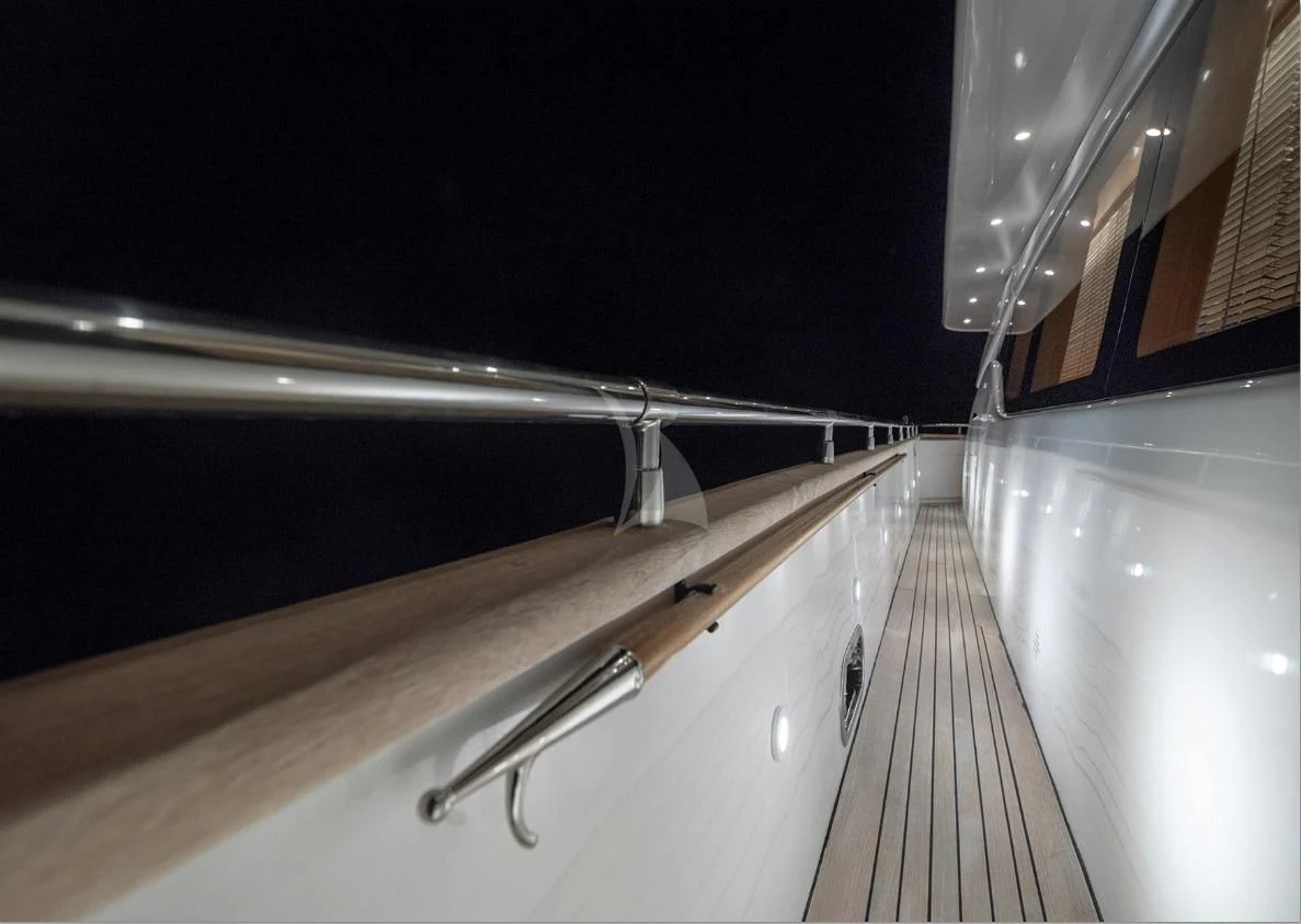 a large white rectangular object with a metal handle on a wooden surface aboard IRENE'S Yacht for Sale