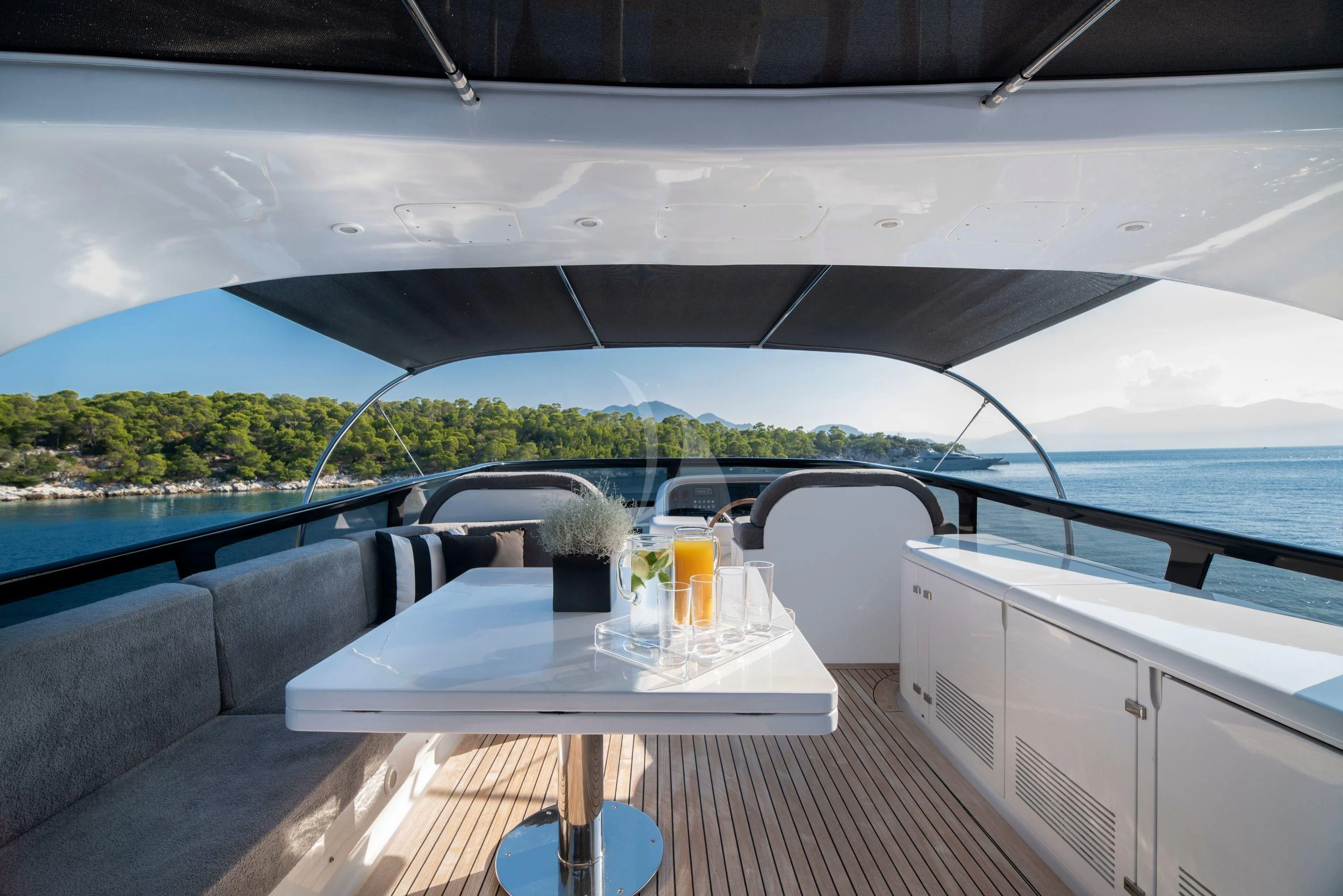 a table on a deck aboard IRENE'S Yacht for Sale