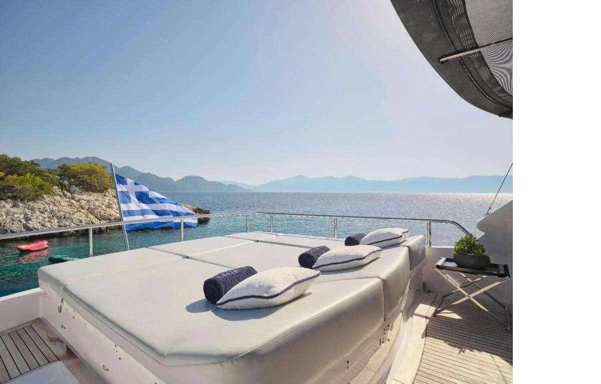 a bed on a balcony aboard IRENE'S Yacht for Sale