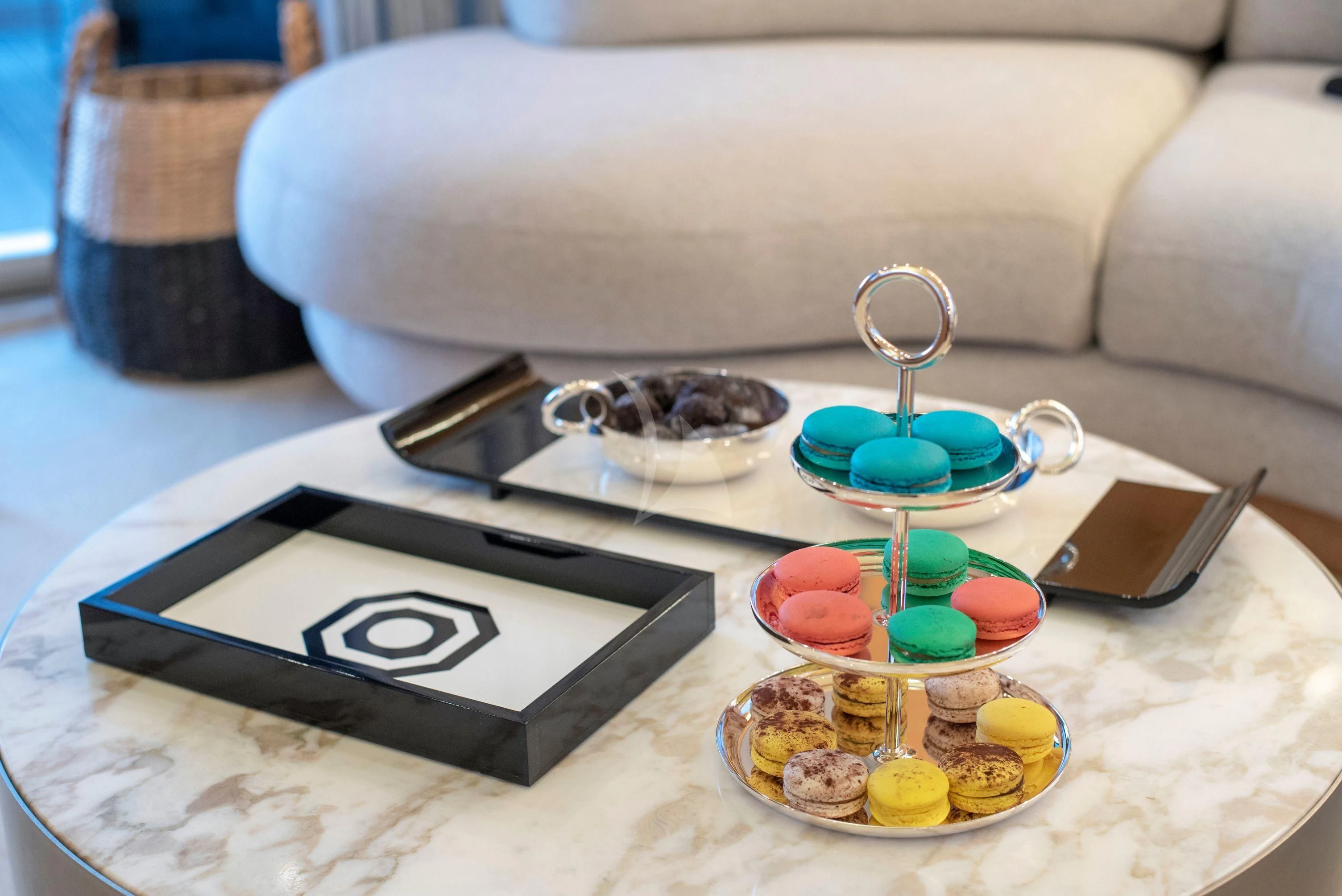 a table with a phone and a plate of food aboard IRENE'S Yacht for Sale