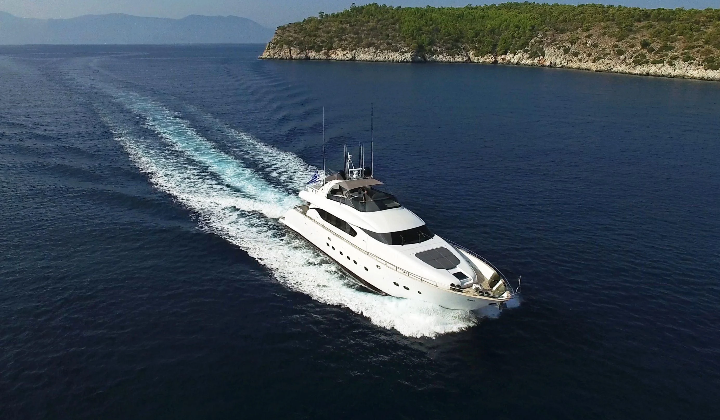 a white yacht on the water aboard IRENE'S Yacht for Sale
