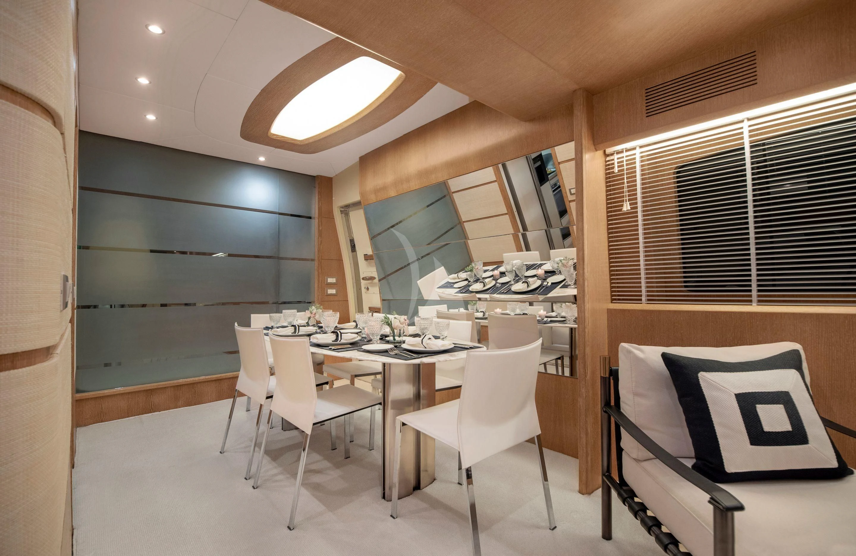 a room with a table and chairs aboard IRENE'S Yacht for Sale